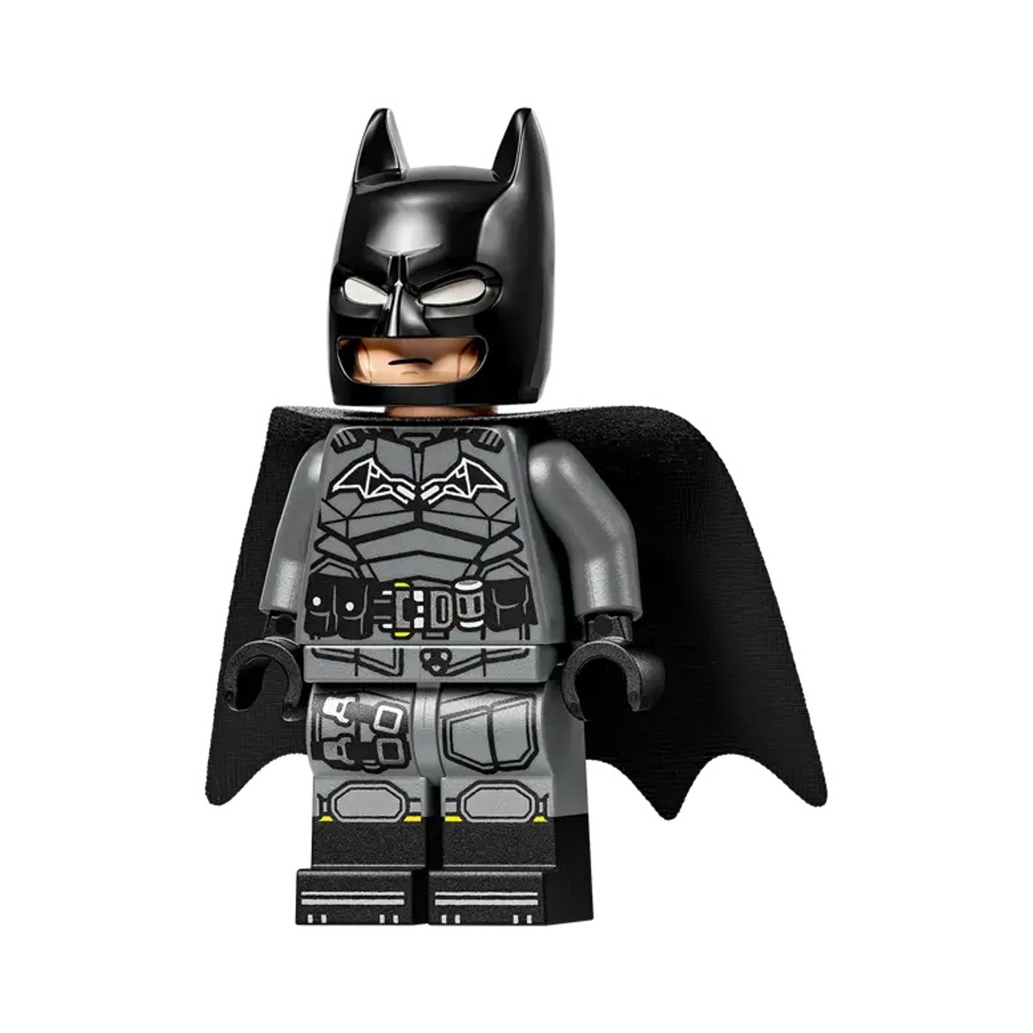 Una figura Lego di Batman in grigio con mantello e maschera neri.