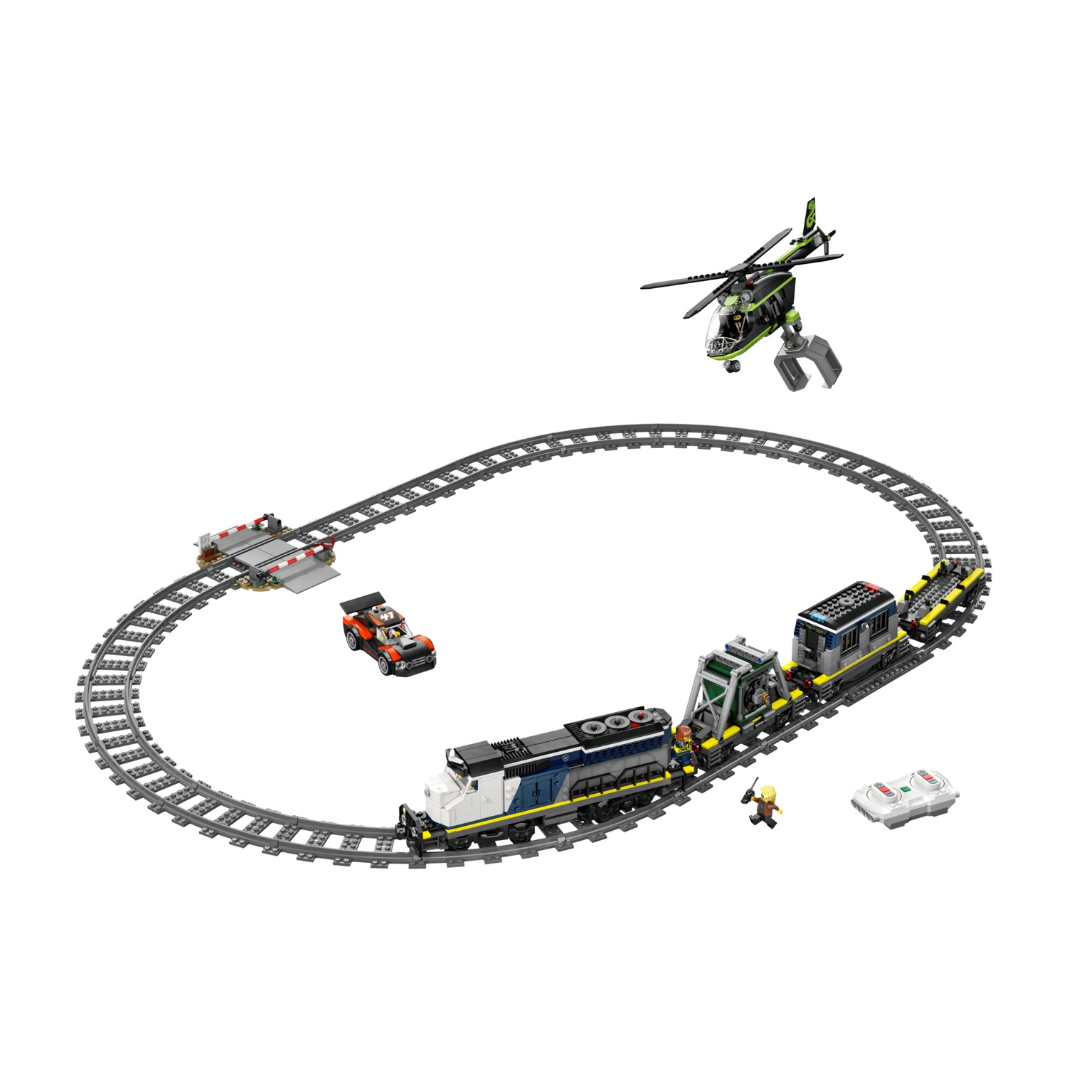 Un set di treno Lego con elicottero, auto e telecomando su sfondo bianco.