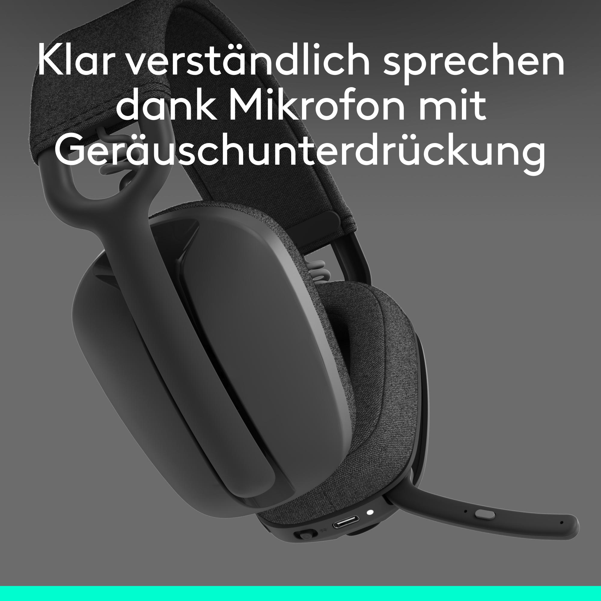 Schwarze Kopfhörer mit Mikrofon und Geräuschunterdrückung auf grauem Hintergrund.