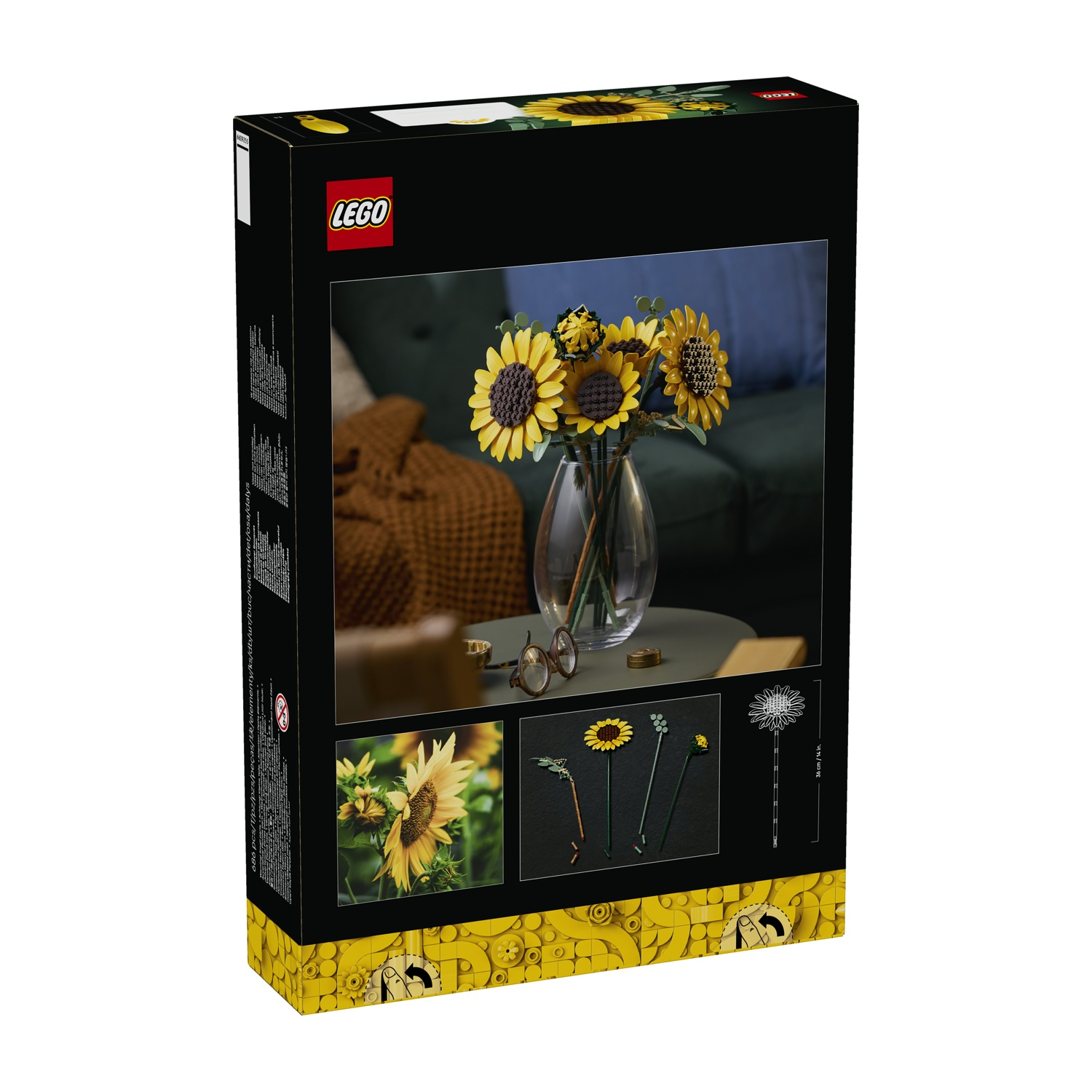 Una scatola LEGO con un vaso di girasoli LEGO e fiori LEGO più piccoli.
