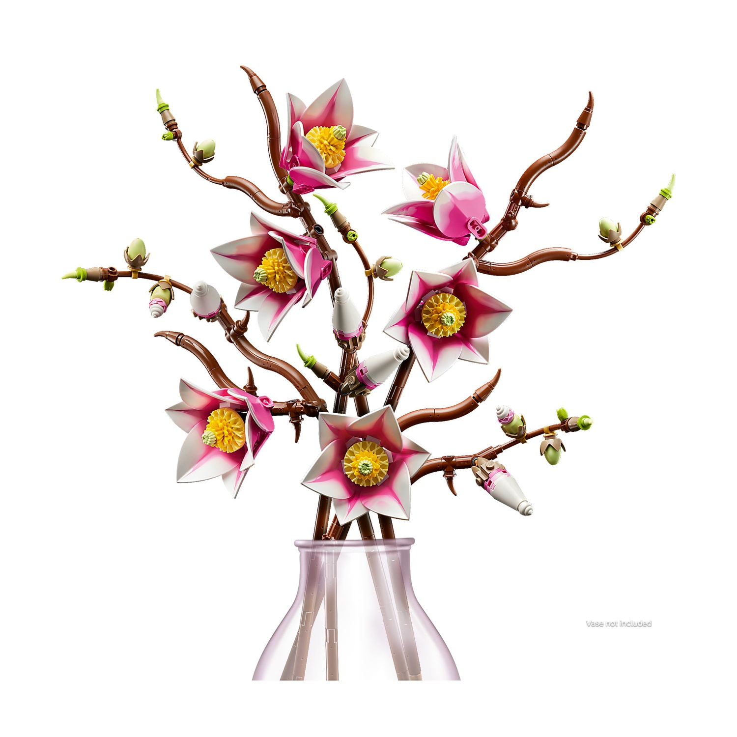 Rami marroni con fiori e boccioli rosa e bianchi in un vaso.