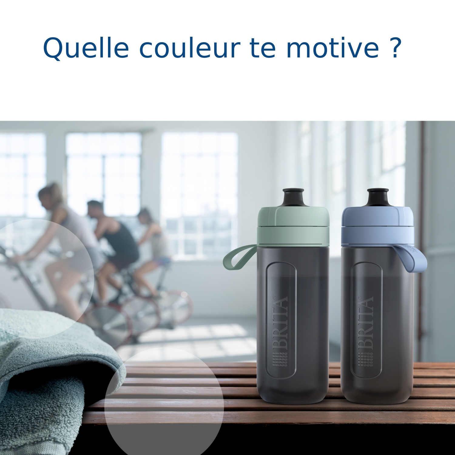 Two Brita water bottles, one light green, one light blue, on wooden table.
