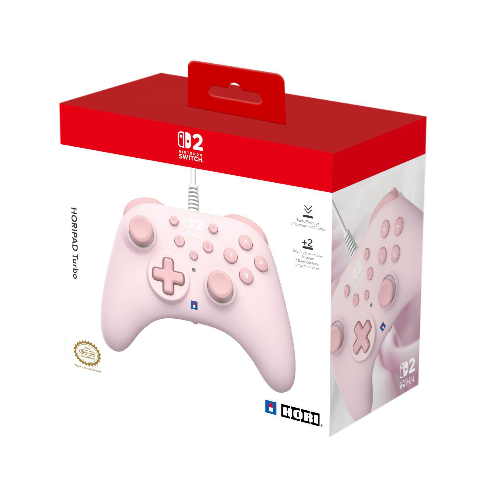 Ein rosafarbener Nintendo Switch Controller mit Kabel und Verpackung.