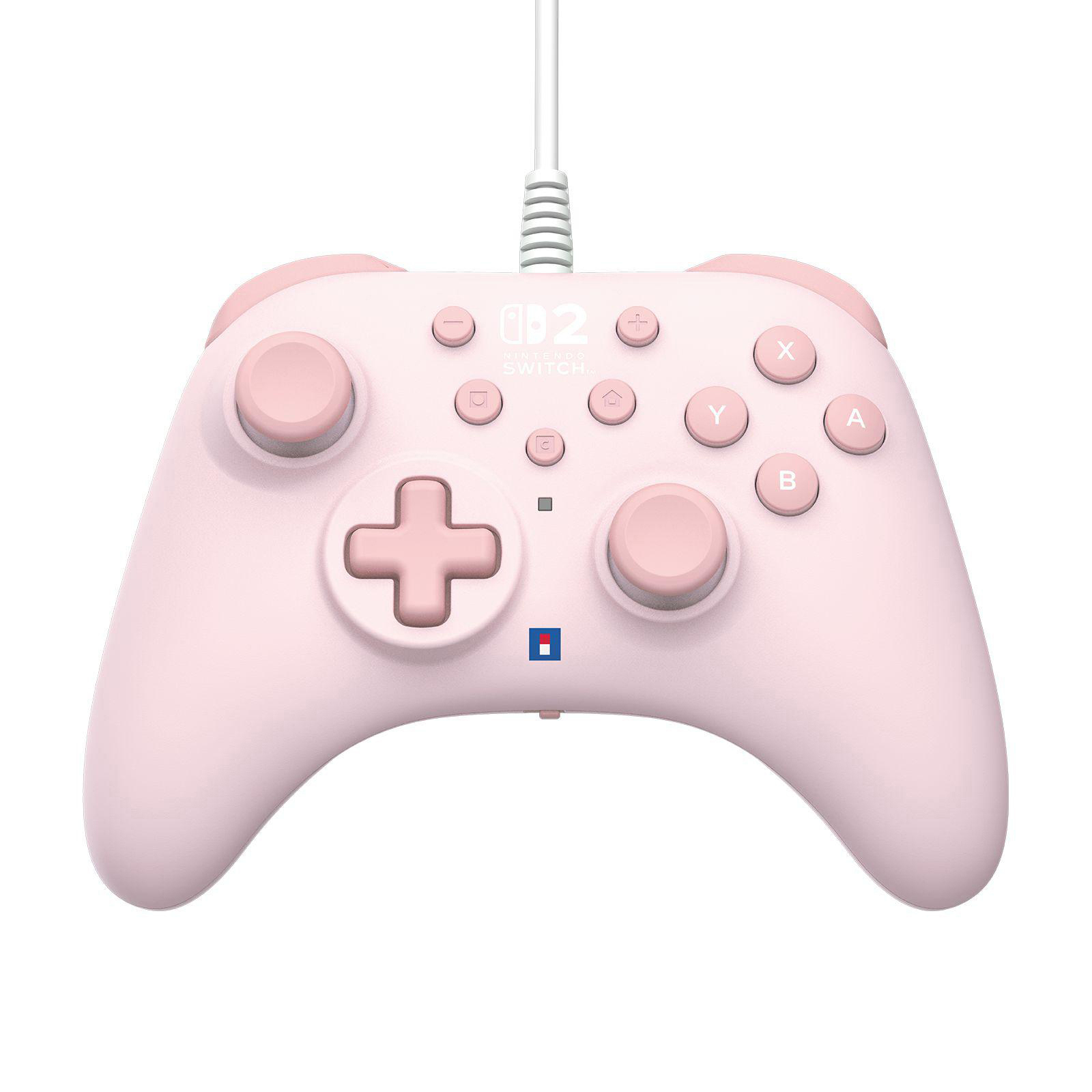 Ein rosafarbener Nintendo Switch Controller mit Kabel liegt auf weißem Hintergrund.