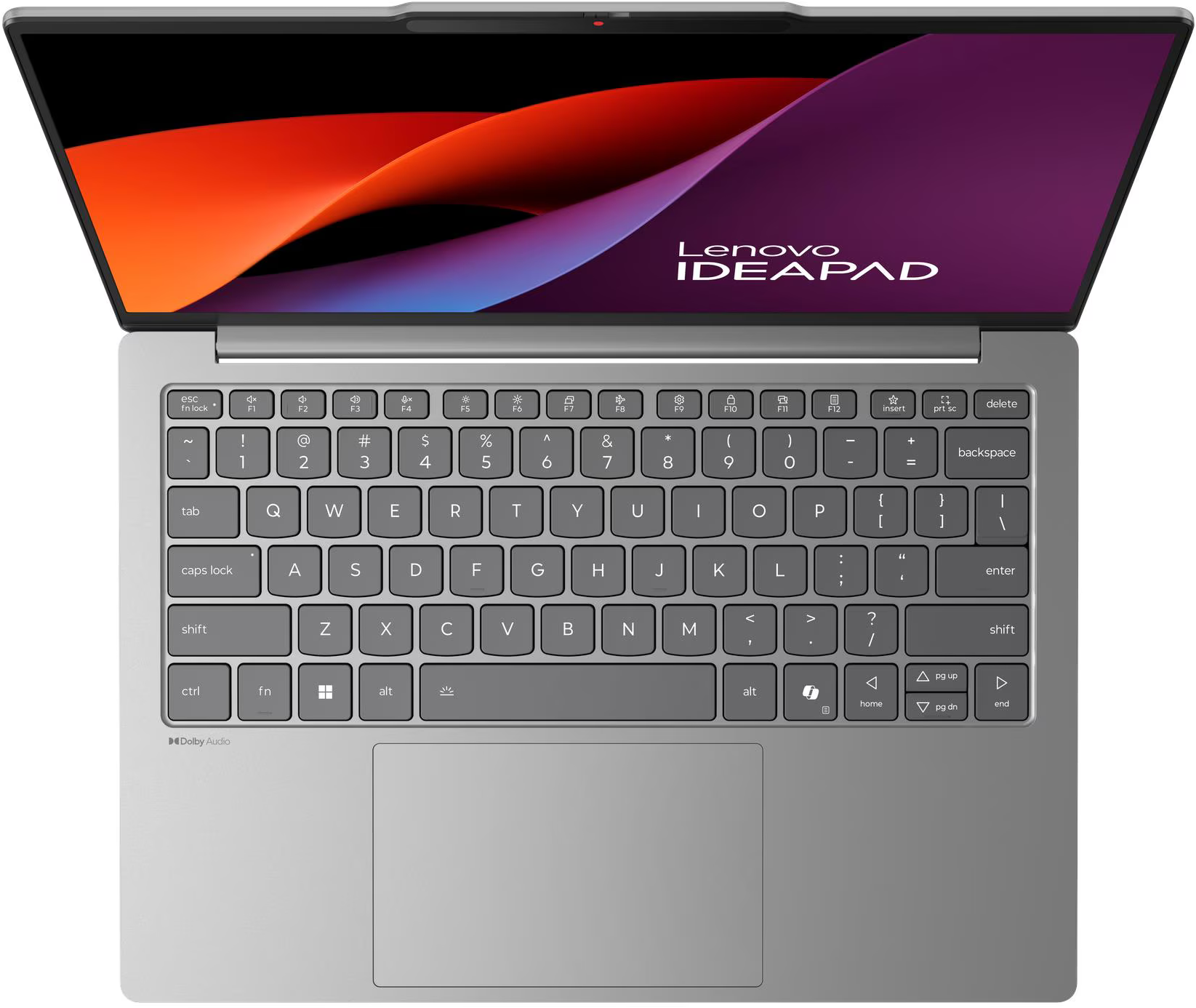 Egy nyitott ezüst Lenovo Ideapad laptop élénk absztrakt háttérképet jelenít meg a képernyőjén.