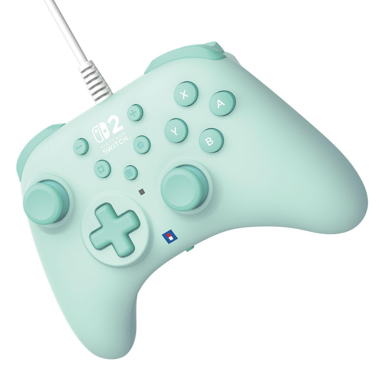 Ein mintgrüner Nintendo Switch Controller mit weißem Kabel und Tasten.