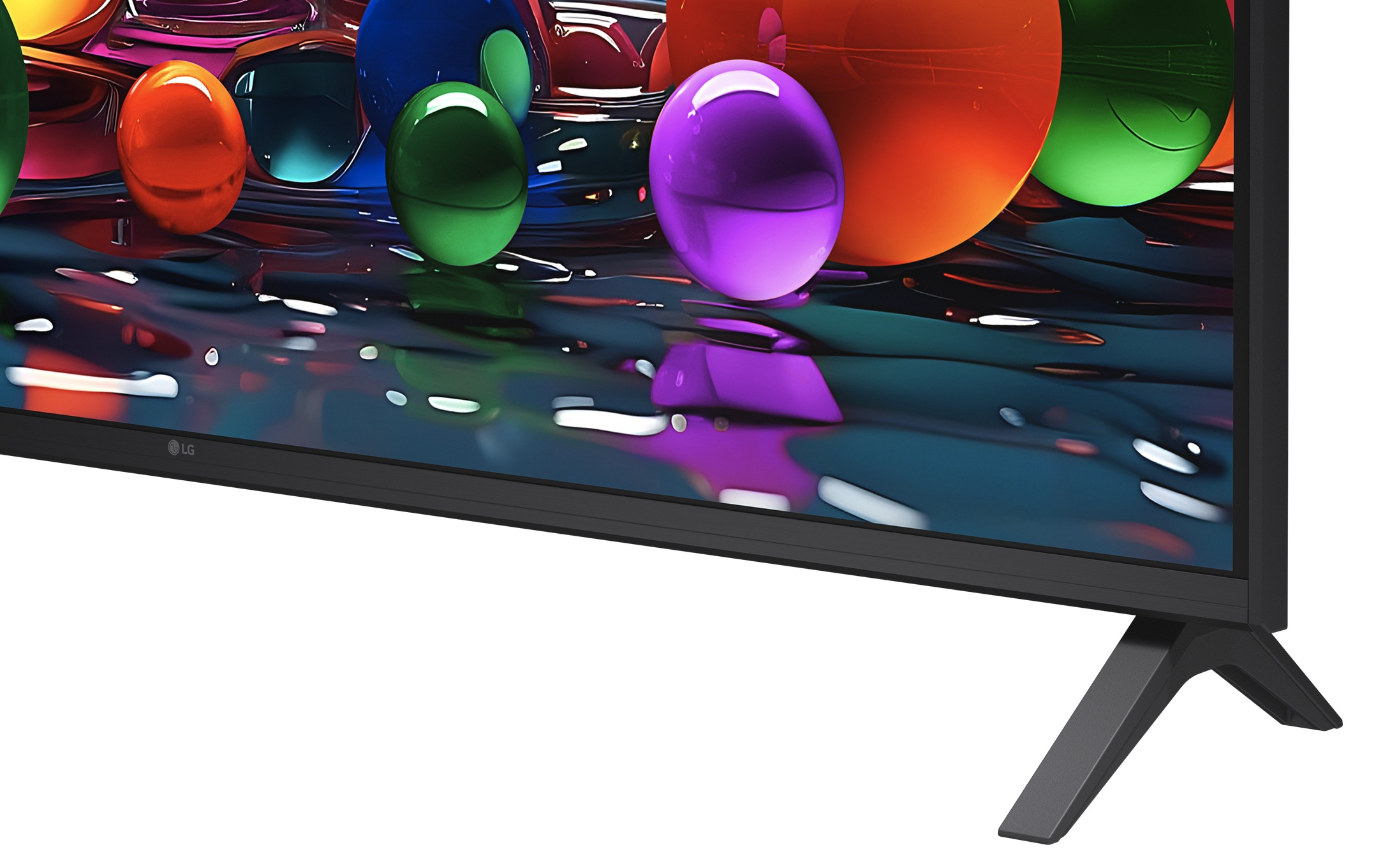 Telewizor LG wyświetla abstrakcyjną, kolorową grafikę z kulami.