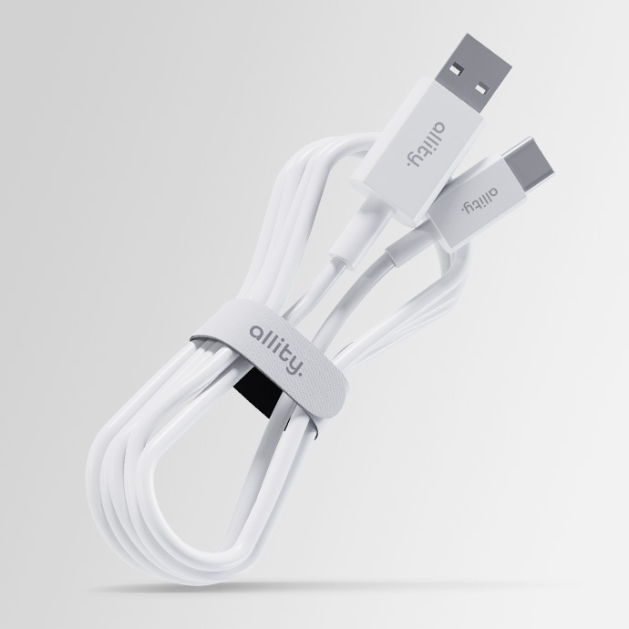 Fehér USB-C kábel USB-A csatlakozóval, tépőzárral összekötve.