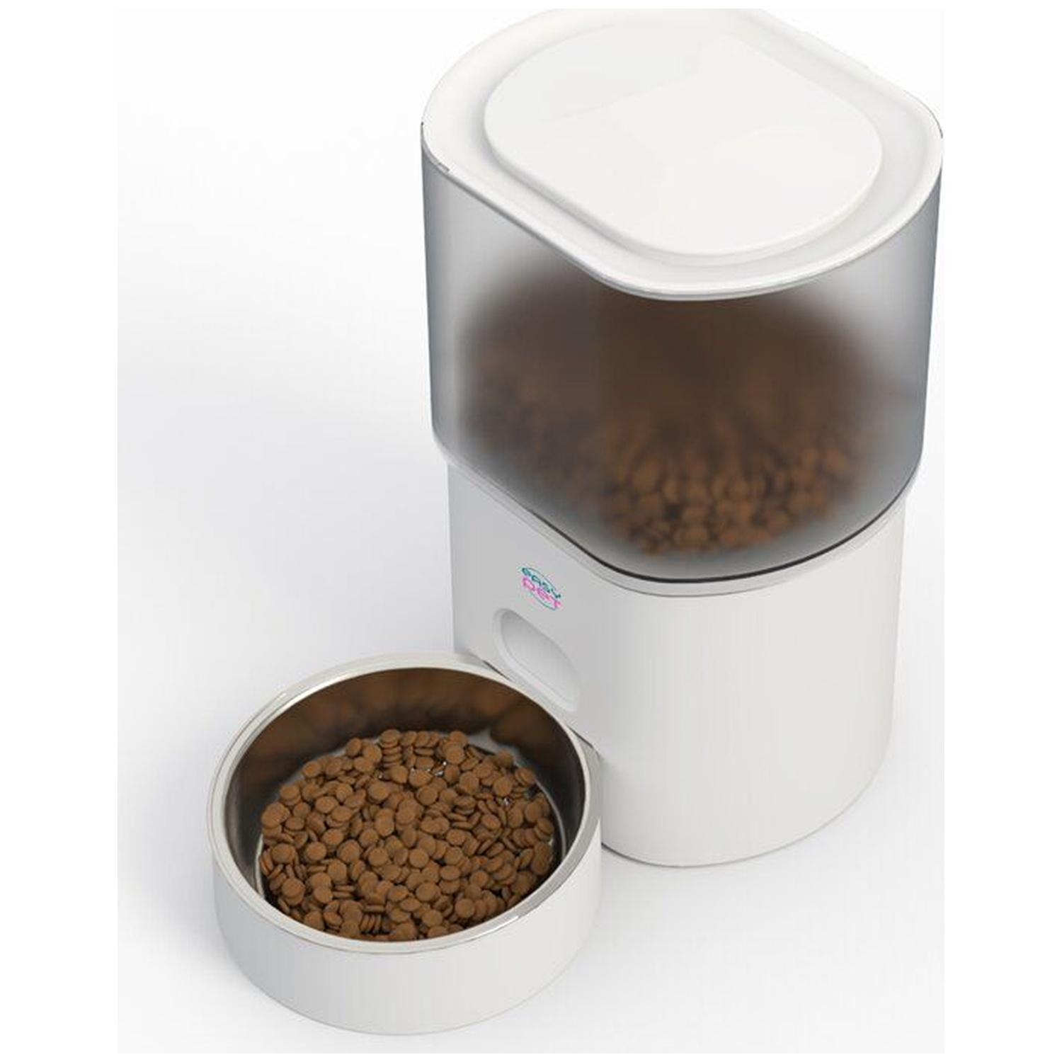 A white automatic pet feeder with a clear container full of brown kibble and a bowl beside it.