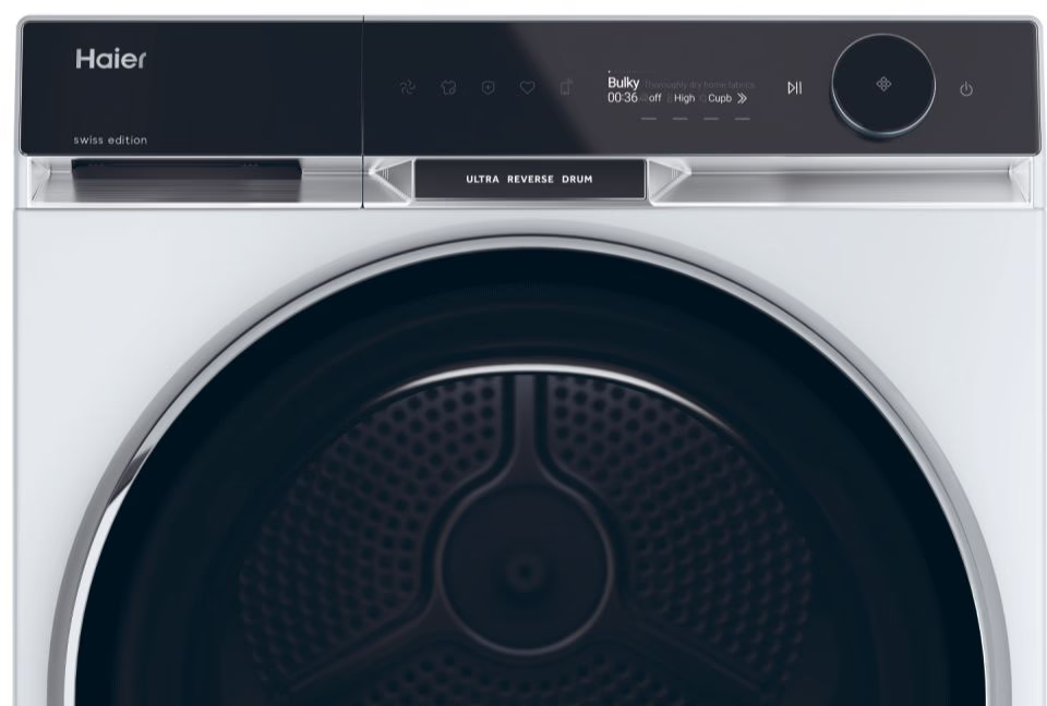 Haier Trockner mit digitalem Display und runder Trommel.