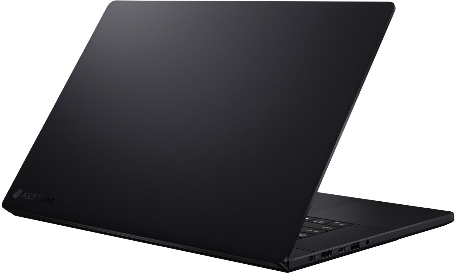 Portátil Asus ProArt negro de perfil, con tapa abierta y teclado visible.
