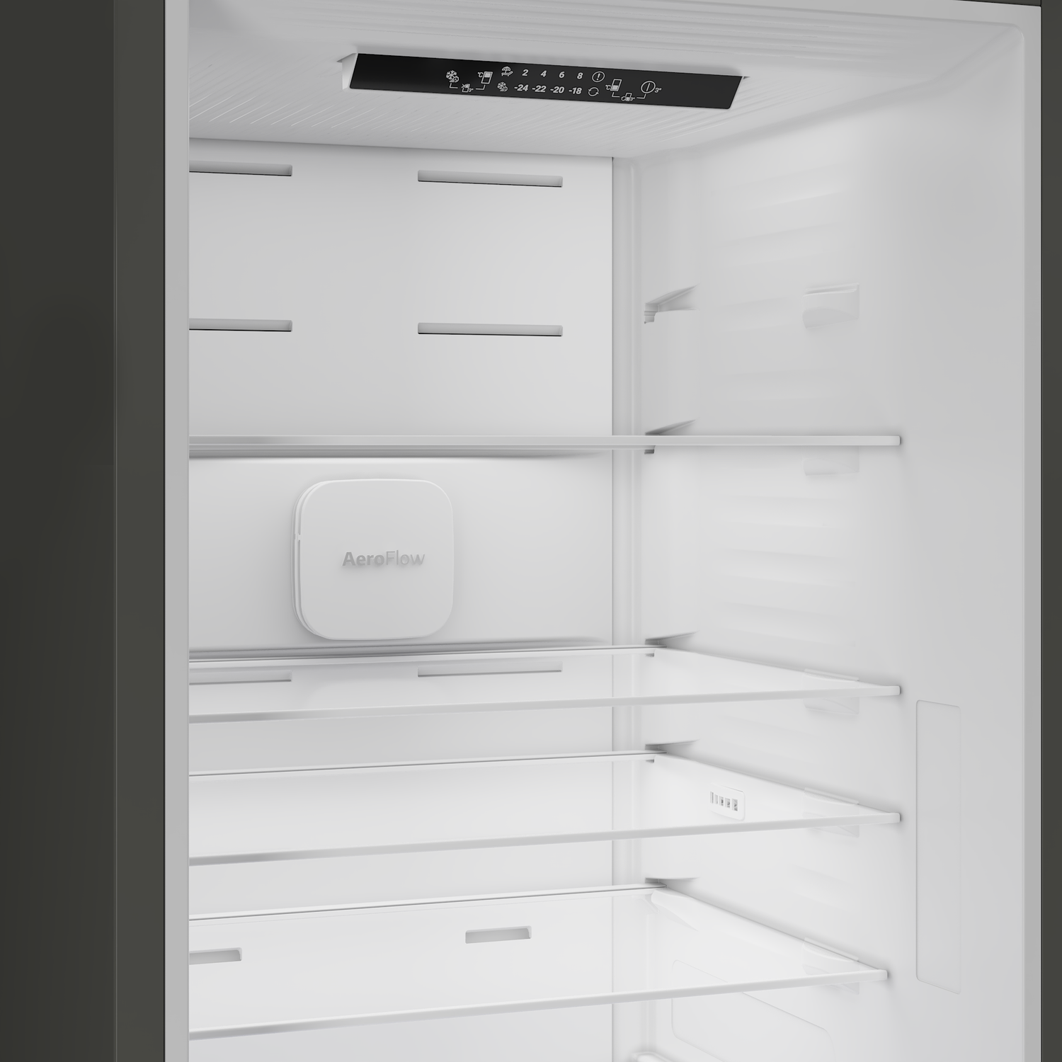 Interior view of an empty refrigerator with shelves and control panel.