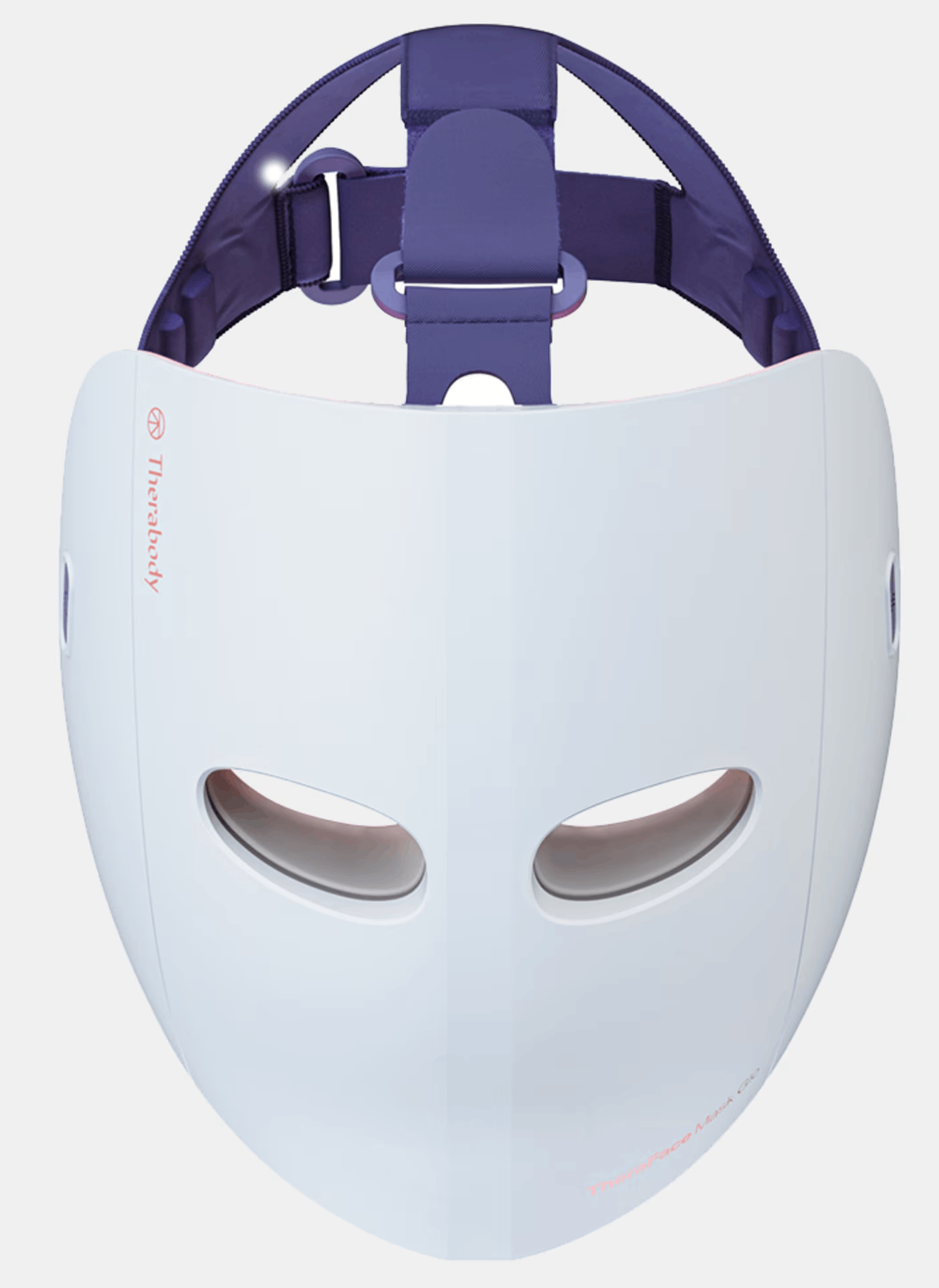 Mascarilla facial blanca con correa morada y aberturas para ojos.