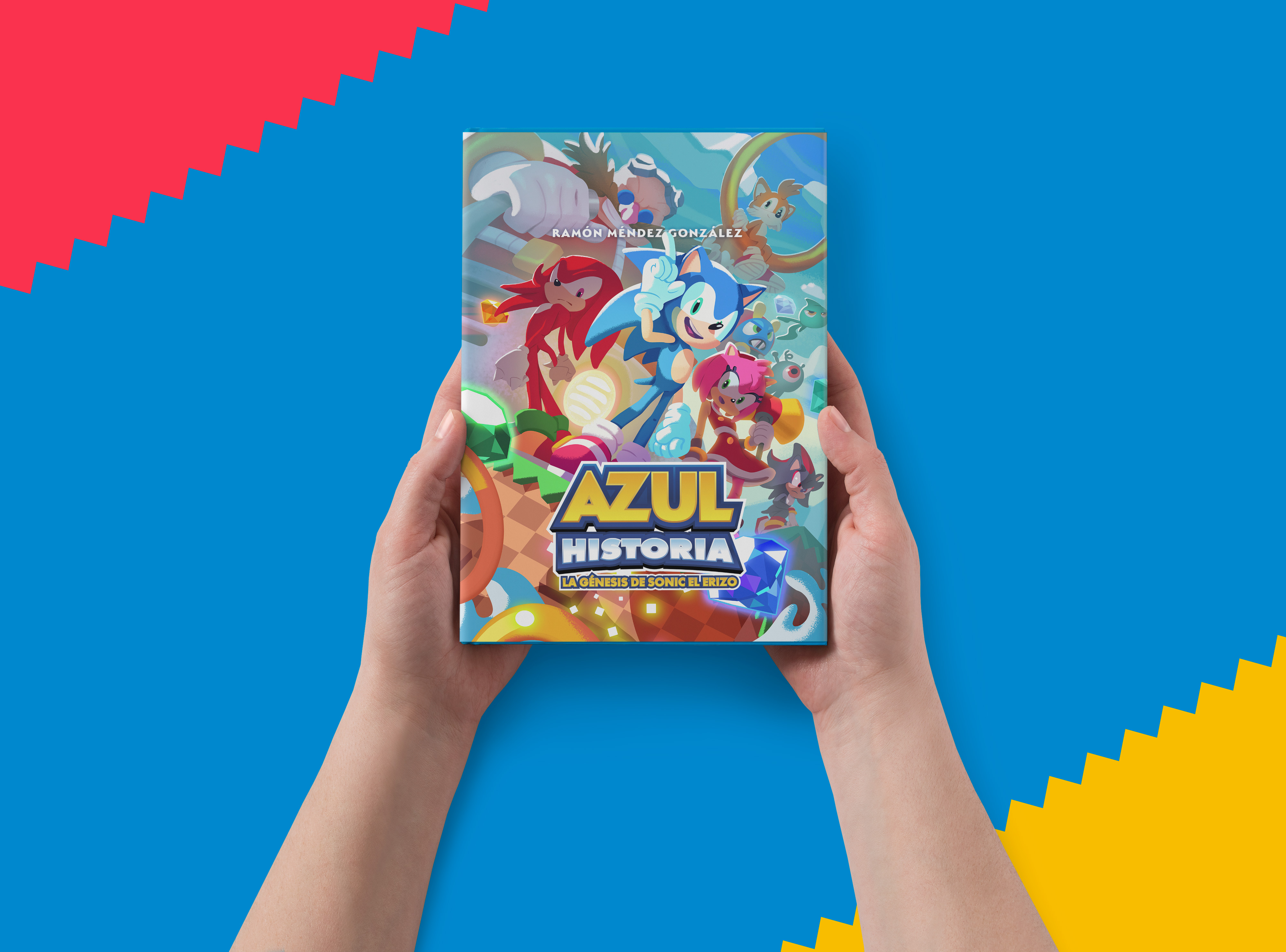 Sonic, Tails, Knuckles y Amy en la portada de un libro sostenido por manos.