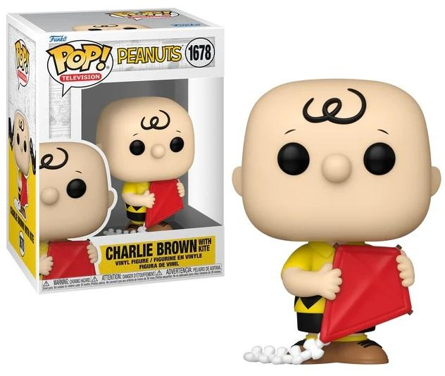 Figura Funko Pop de Charlie Brown con cometa roja, en caja.
