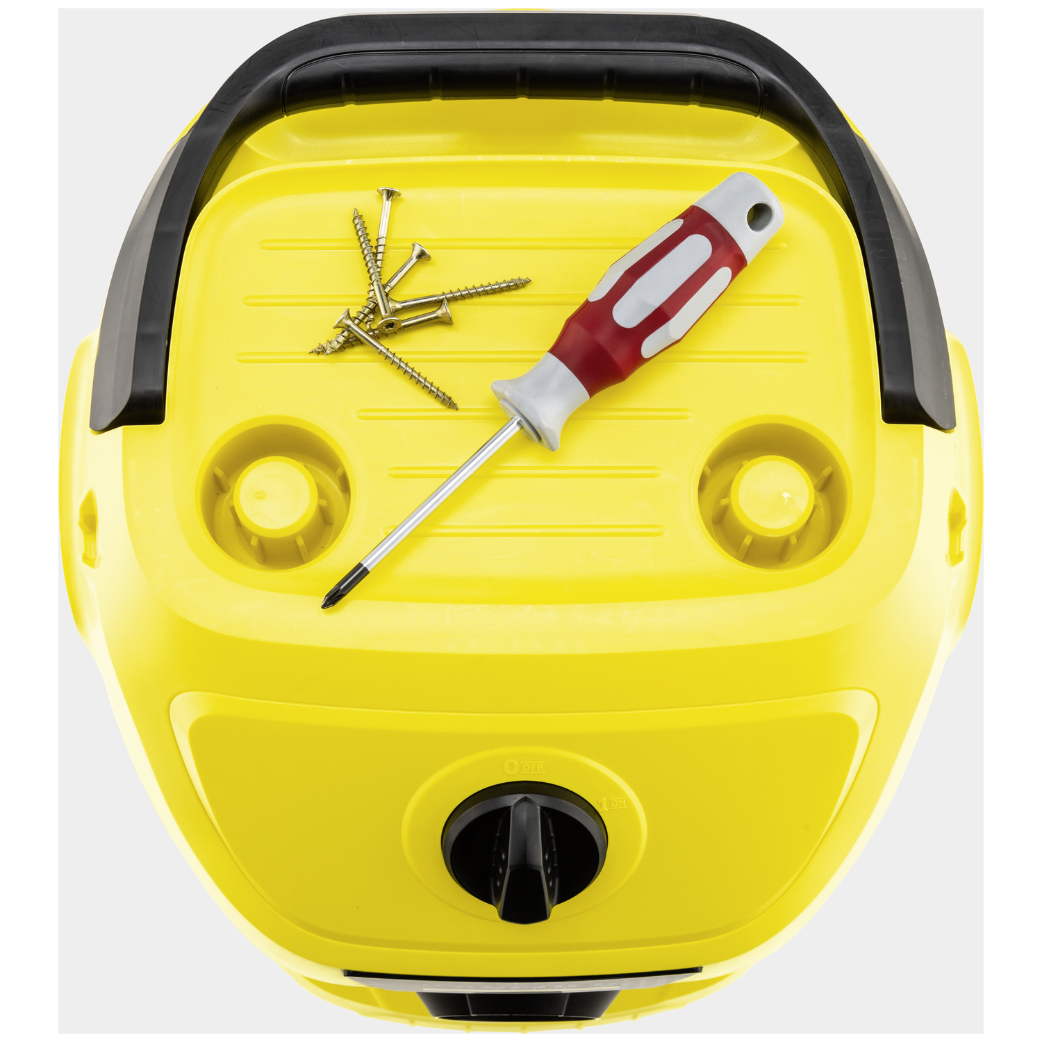 A yellow device with screws and a screwdriver on top.