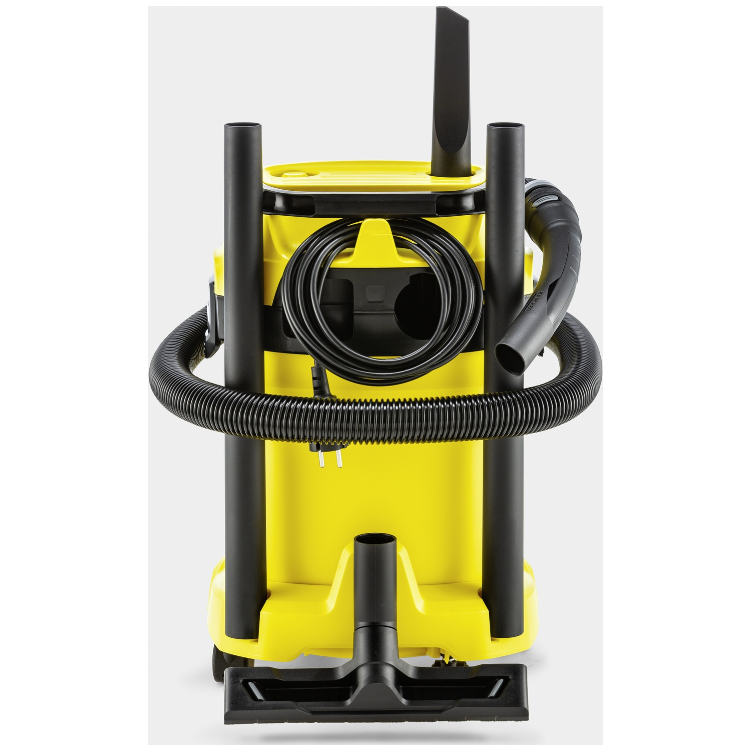 A yellow Karcher wet/dry vacuum cleaner with a black hose and accessories.