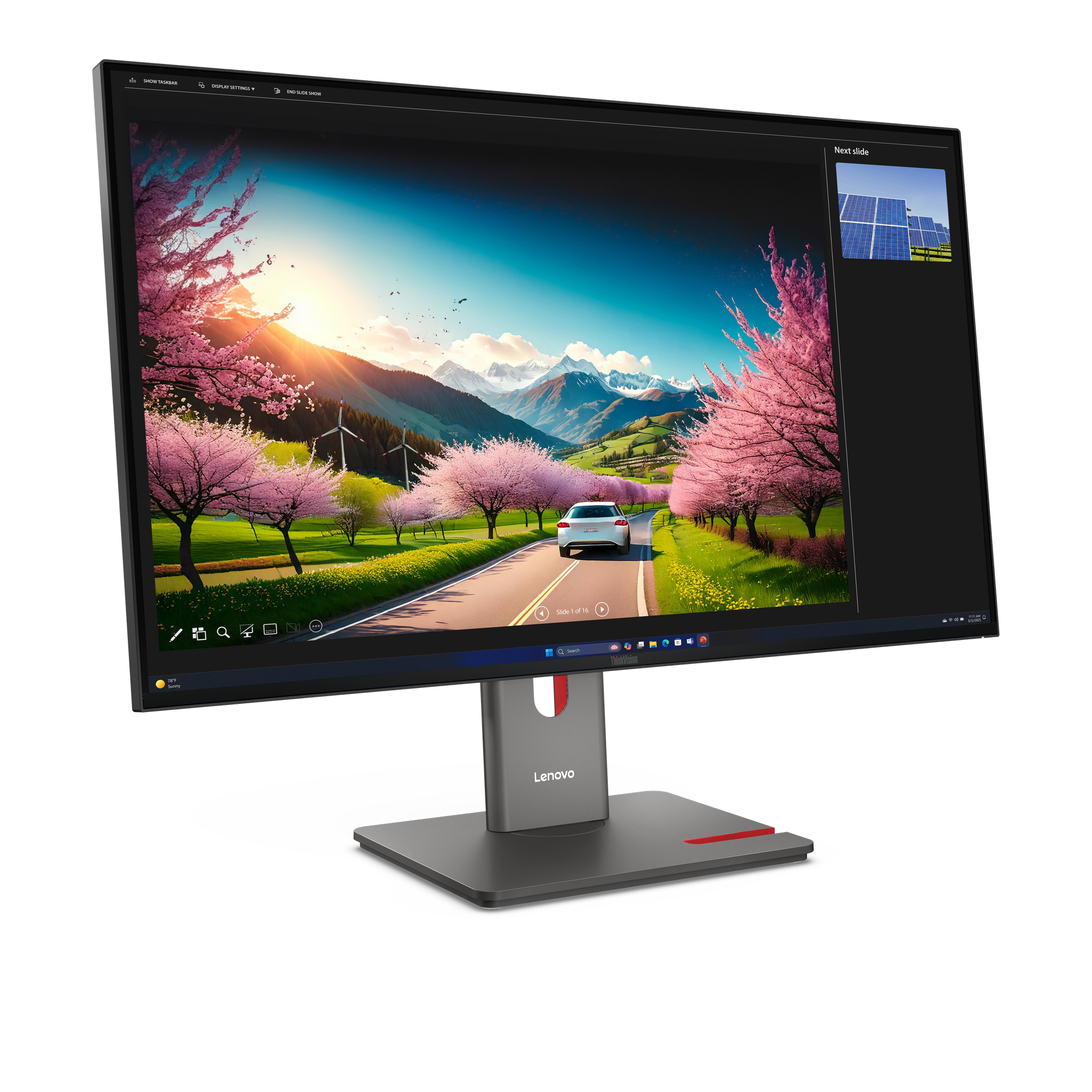 Ein Monitor zeigt eine Frühlingslandschaft mit Kirschblütenbäumen und schneebedeckten Bergen.