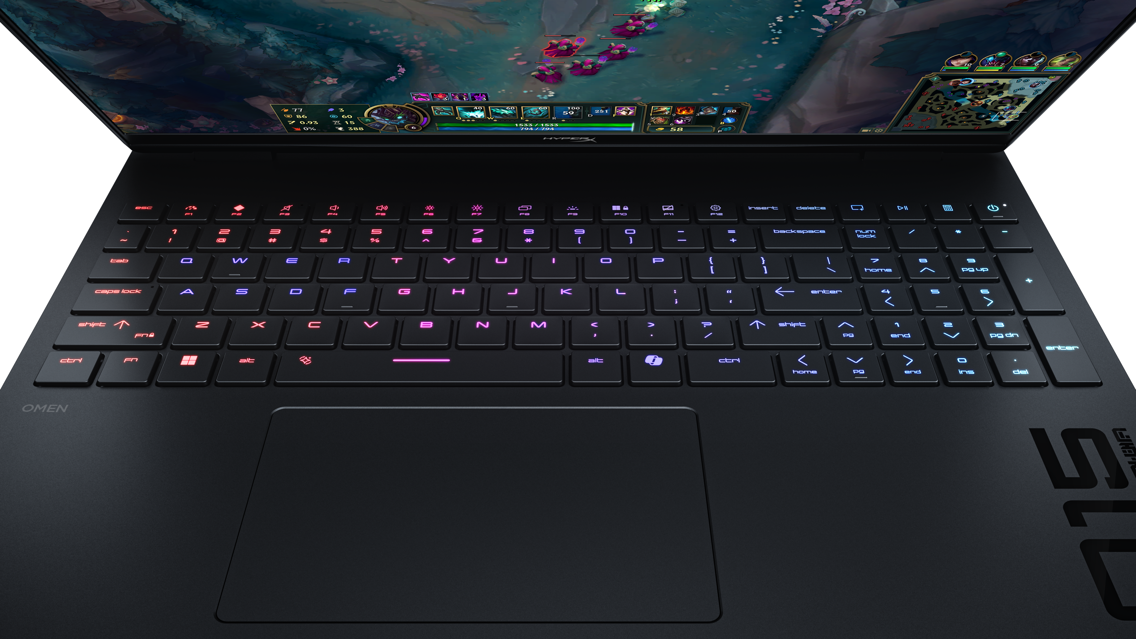 Otwarty czarny laptop wyświetla grę komputerową na podświetlanym ekranie.