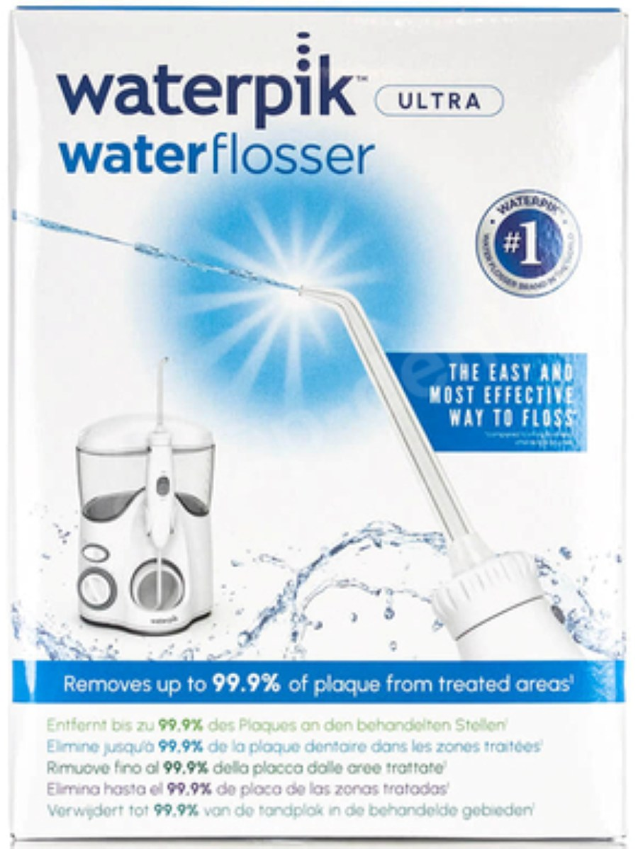 Waterpik Waterflosser Ultra ze zbiornikiem, dyszą i rozpryskami wody.
