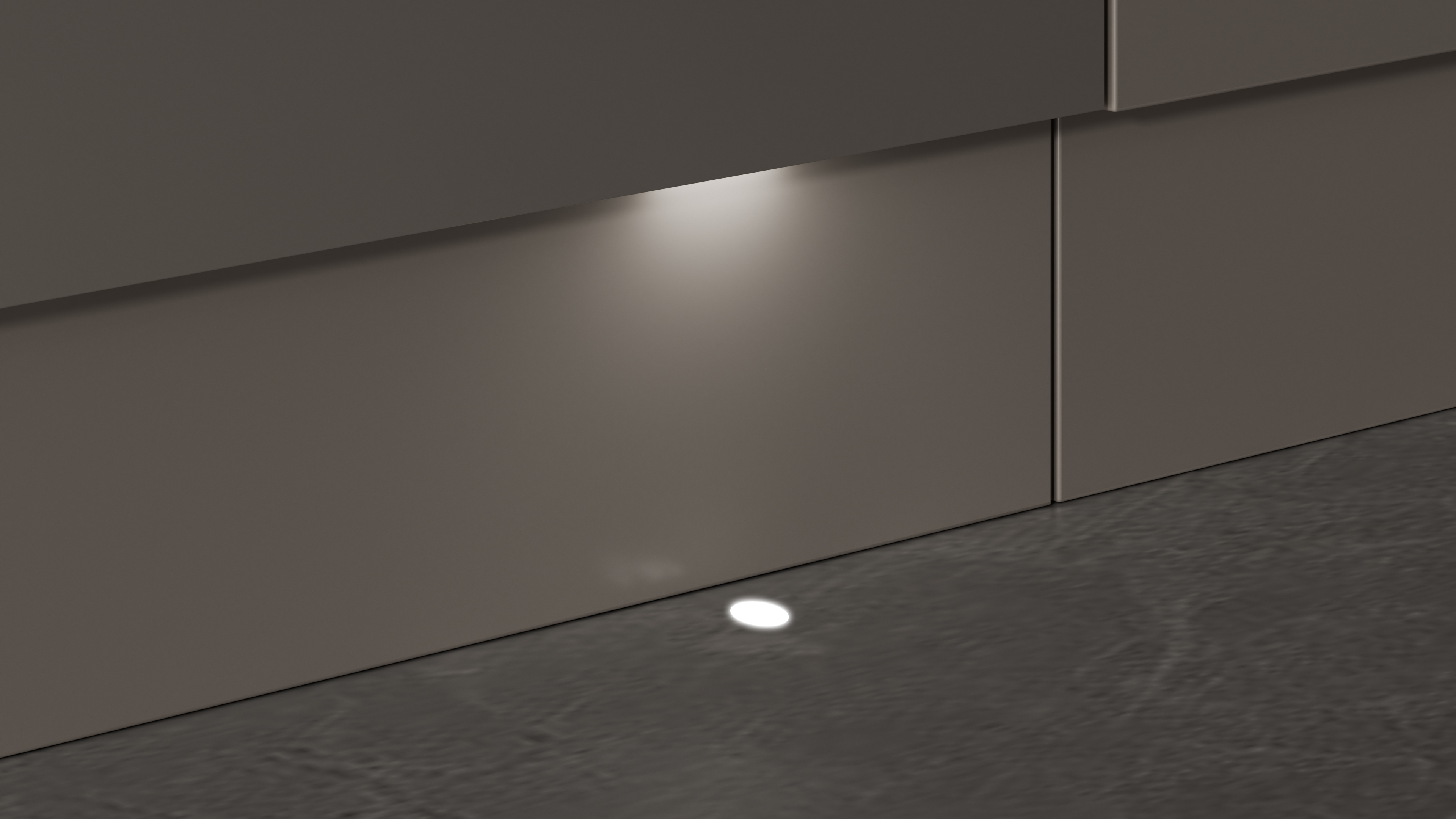 Nowoczesna brązowa ściana z wpuszczonymi światłami podłogowymi i betonową podłogą.