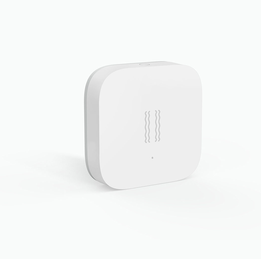 Ein weißer, quadratischer Sensor mit abgerundeten Ecken auf weißem Hintergrund.