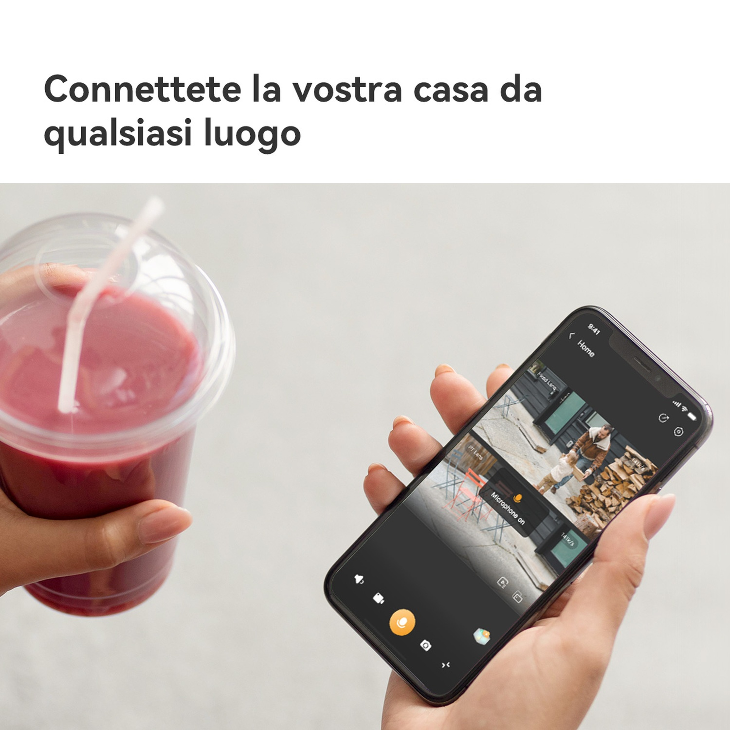 Una mano tiene un frullato rosso; un'altra uno smartphone con un'app di sicurezza.