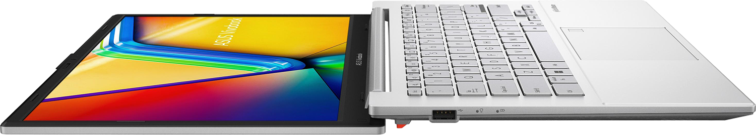 Ezüst laptop háttérvilágítású billentyűzettel és színes háttérképpel.