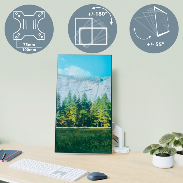 Monitor auf einem Schreibtisch mit Berglandschaftsbild. Halterungsdetails oben.