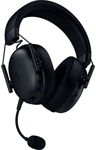 Fekete gamer fejhallgató mikrofonnal és zöld LED visszajelzővel.