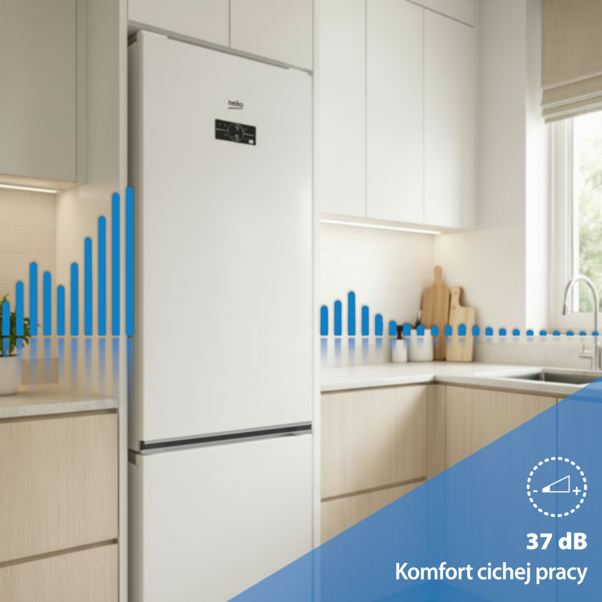 Biała lodówka w nowoczesnej kuchni wskazująca cichą pracę.