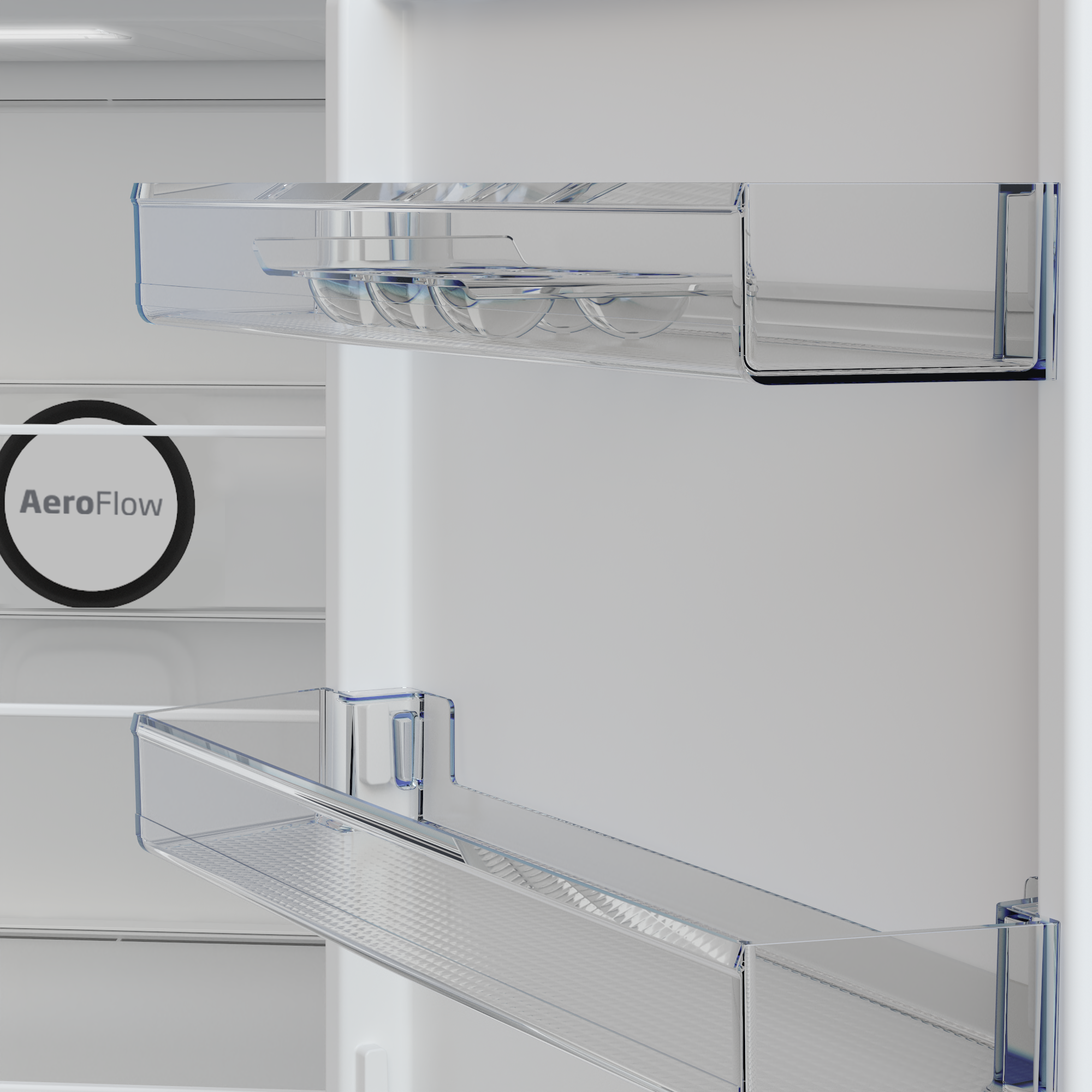 Widok wnętrza lodówki z przezroczystymi półkami i pojemnikami na jajka.