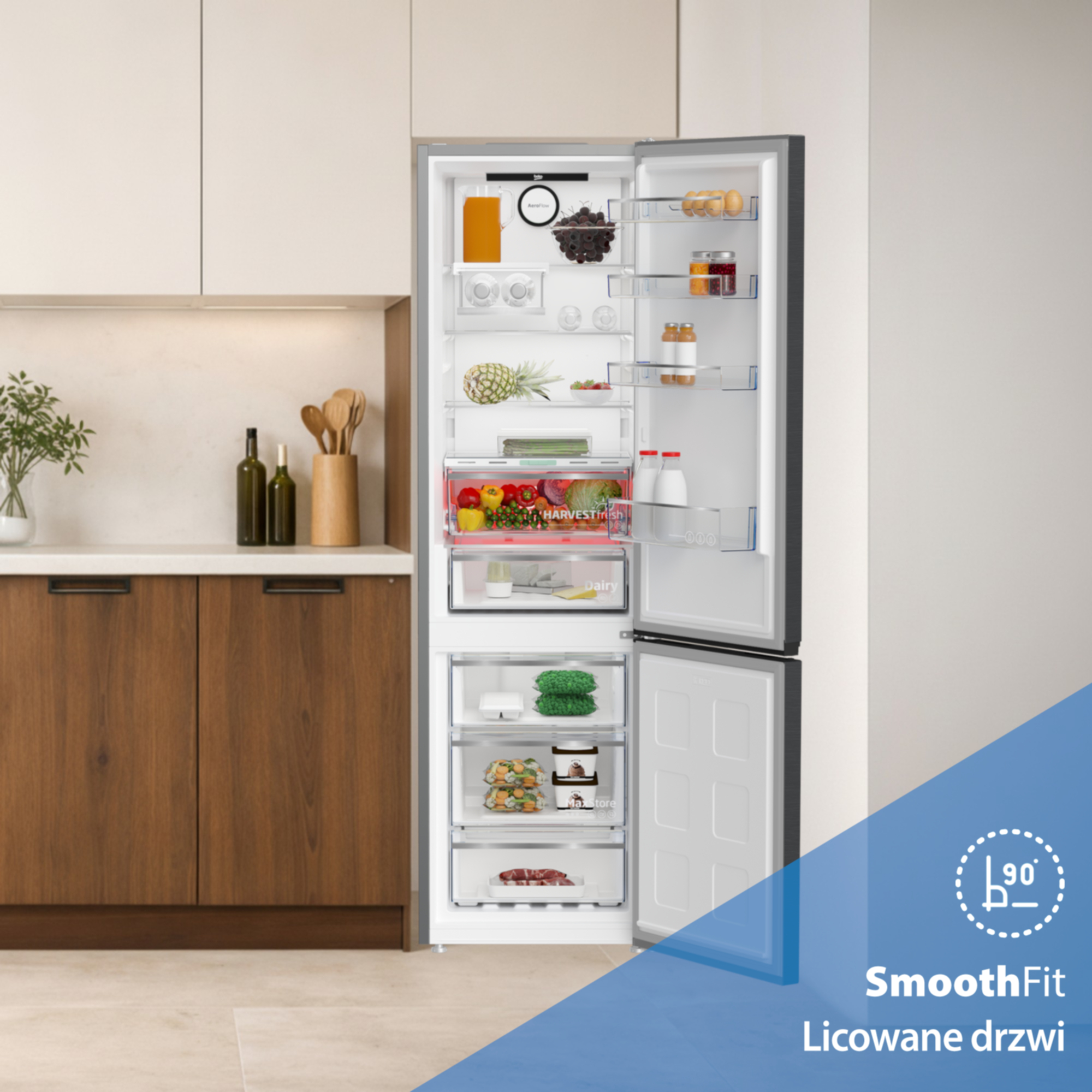 Otwarta lodówka wypełniona produktami spożywczymi, takimi jak owoce, warzywa, jajka i mięso.