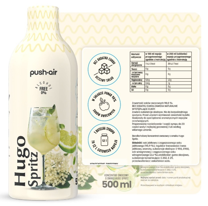 Butelka koncentratu Hugo Spritz z szklanką, cytryną, limonką i kwiatem bzu.