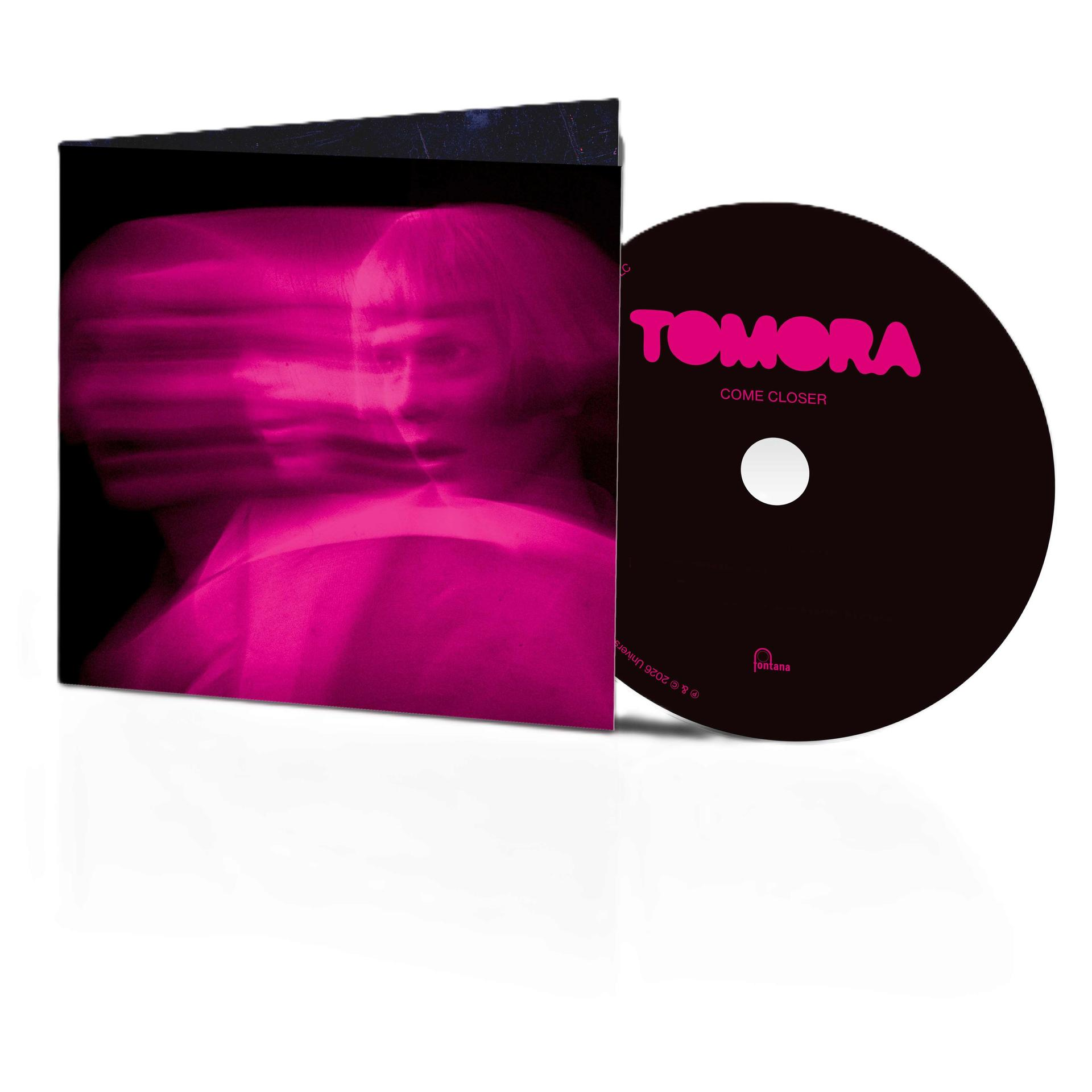 Ein CD-Cover und eine CD mit pinken Gesichtern und Text.
