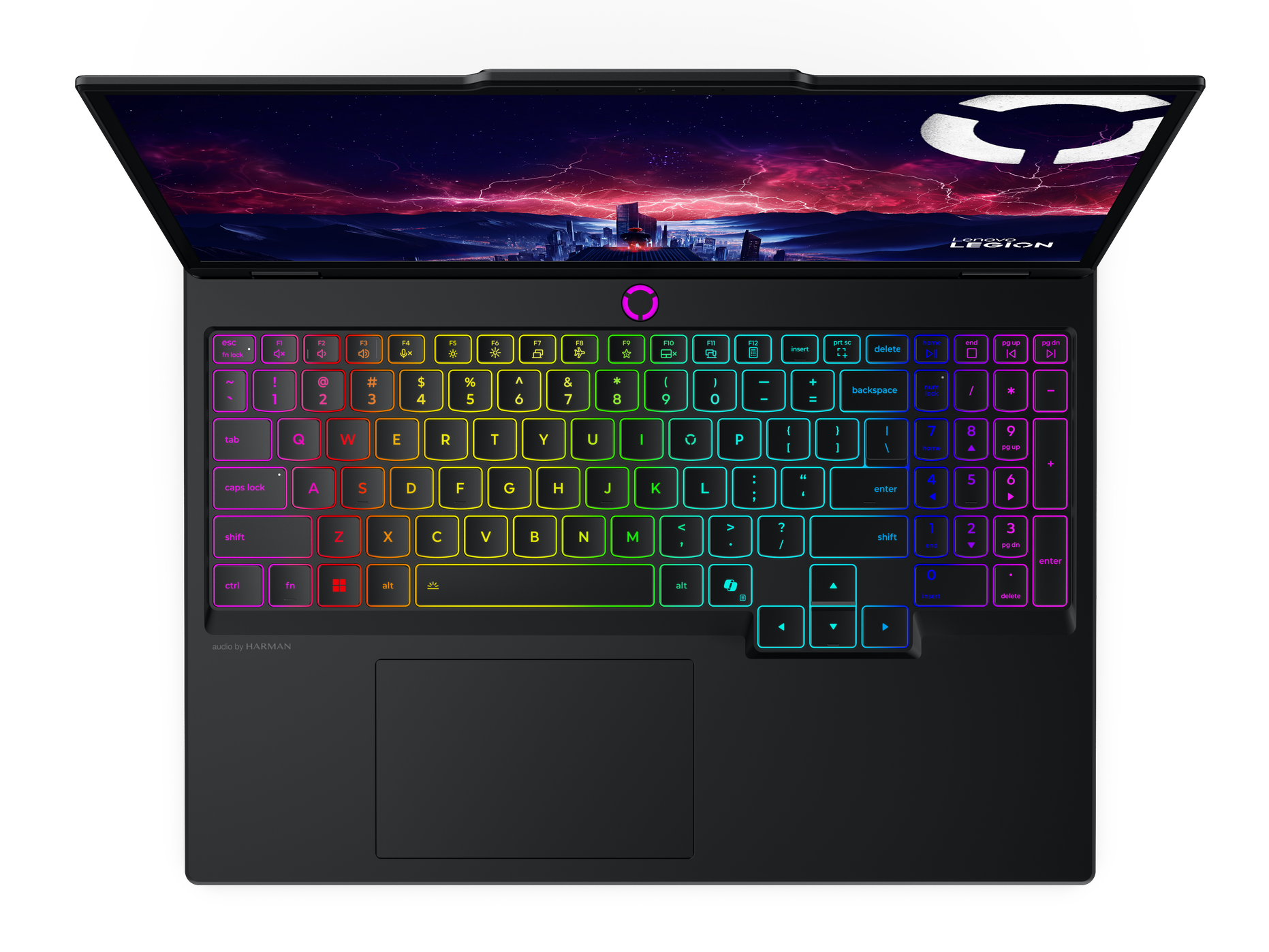 Laptop z podświetlaną klawiaturą i wygaszaczem ekranu z panoramą miasta.