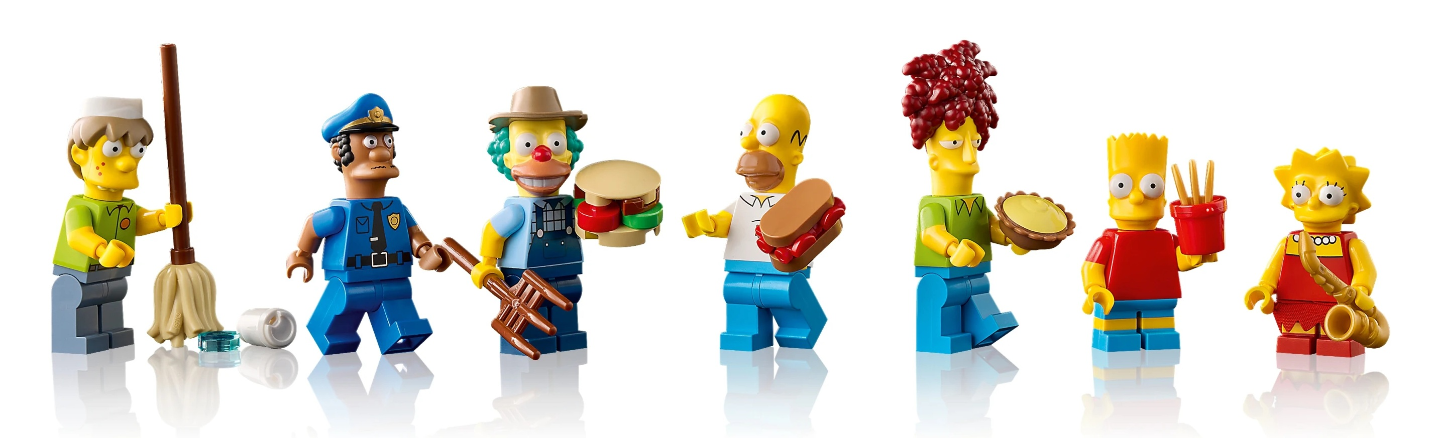 Postacie Lego Simpsonów: Willie, Szef Wiggum, Krusty, Homer, Bob, Bart, Lisa.