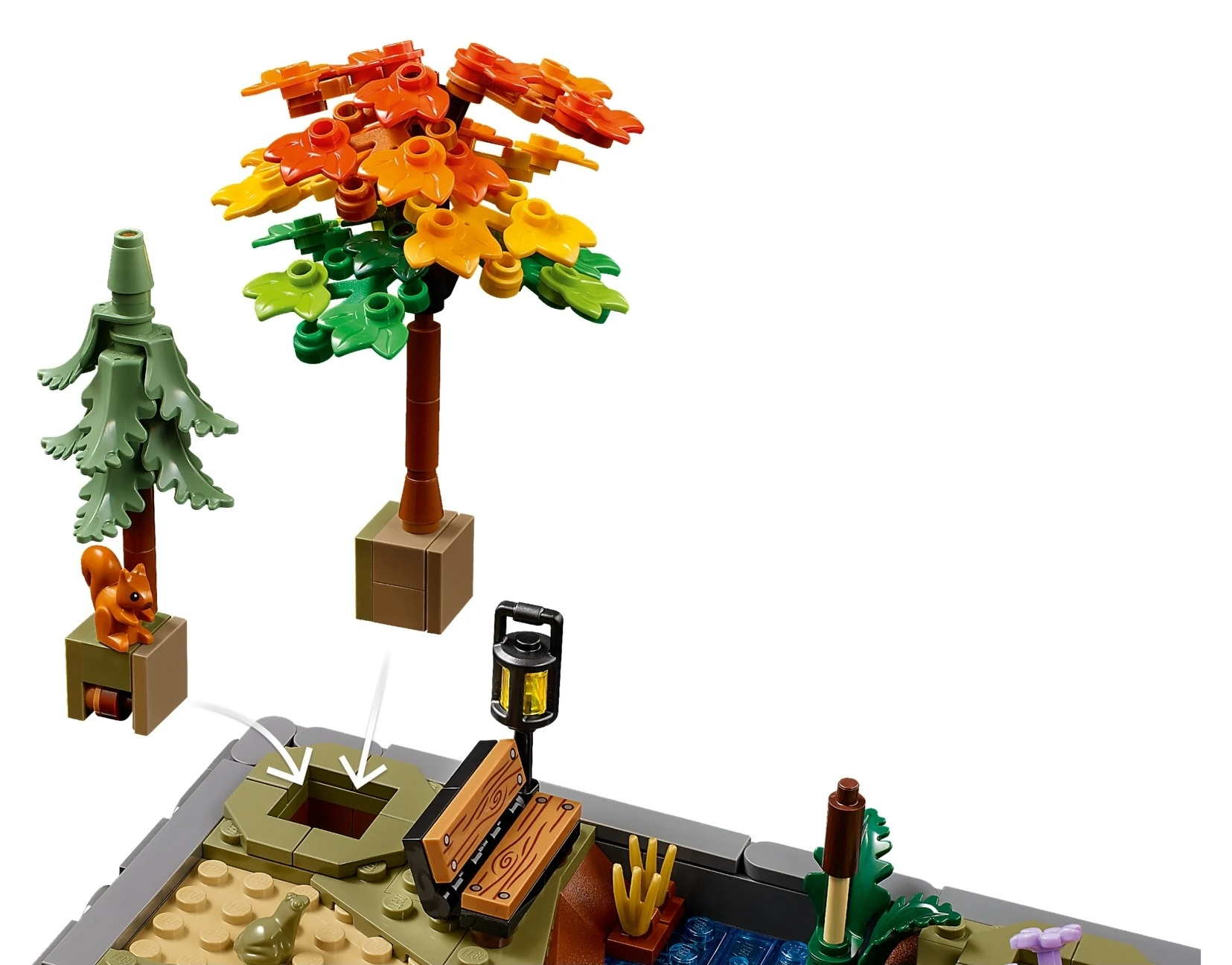 Scena Lego w ogrodzie z drzewami, wiewiórką, ławką i latarnią.