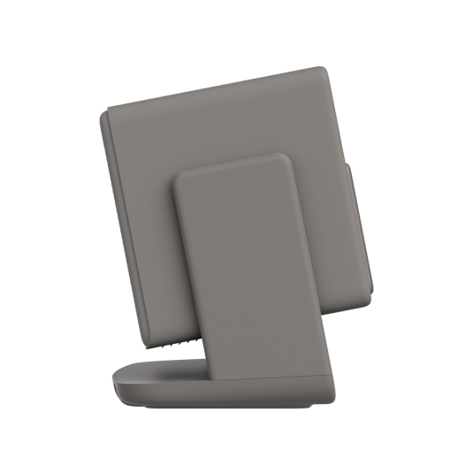 Szare urządzenie ze stojakiem, widziane z boku.