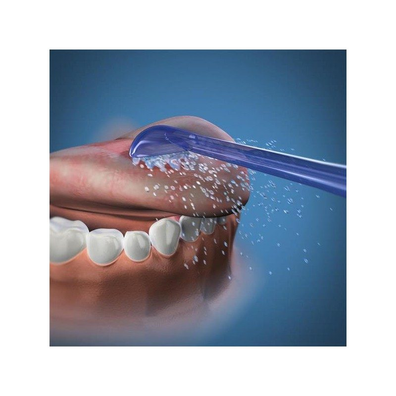 Usta z językiem i zębami czyszczone strumieniem niebieskiej wody.