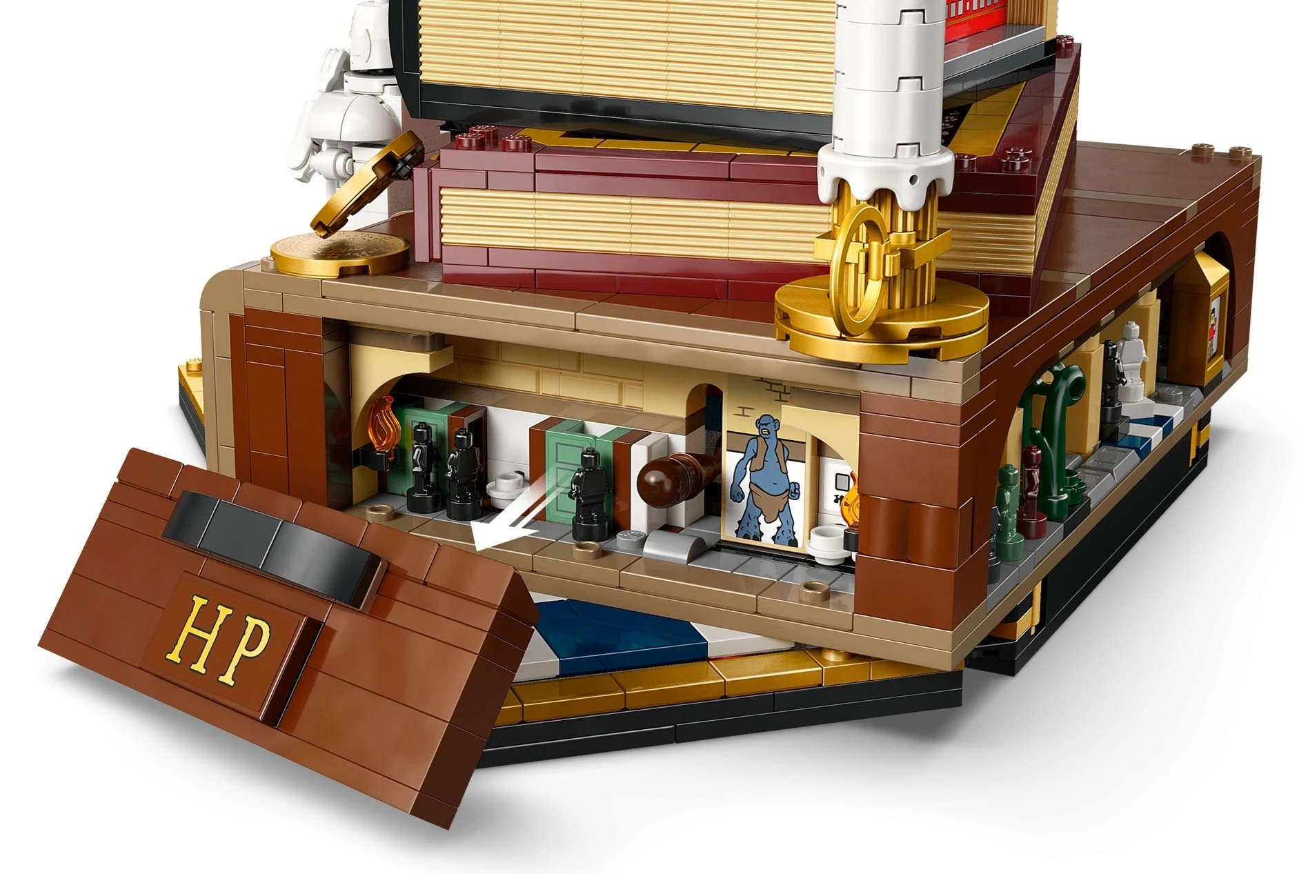 Model Lego otwartej książki ze scenami w środku.