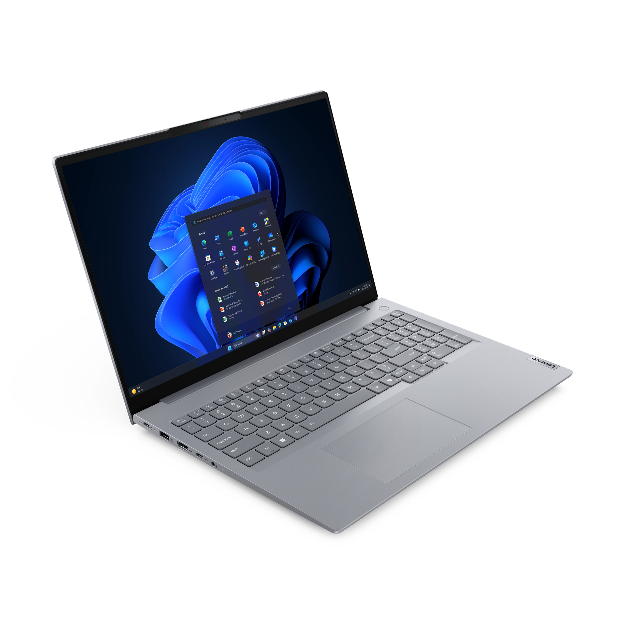 Ein silberner Laptop mit beleuchteter Tastatur und Windows-Startmenü.