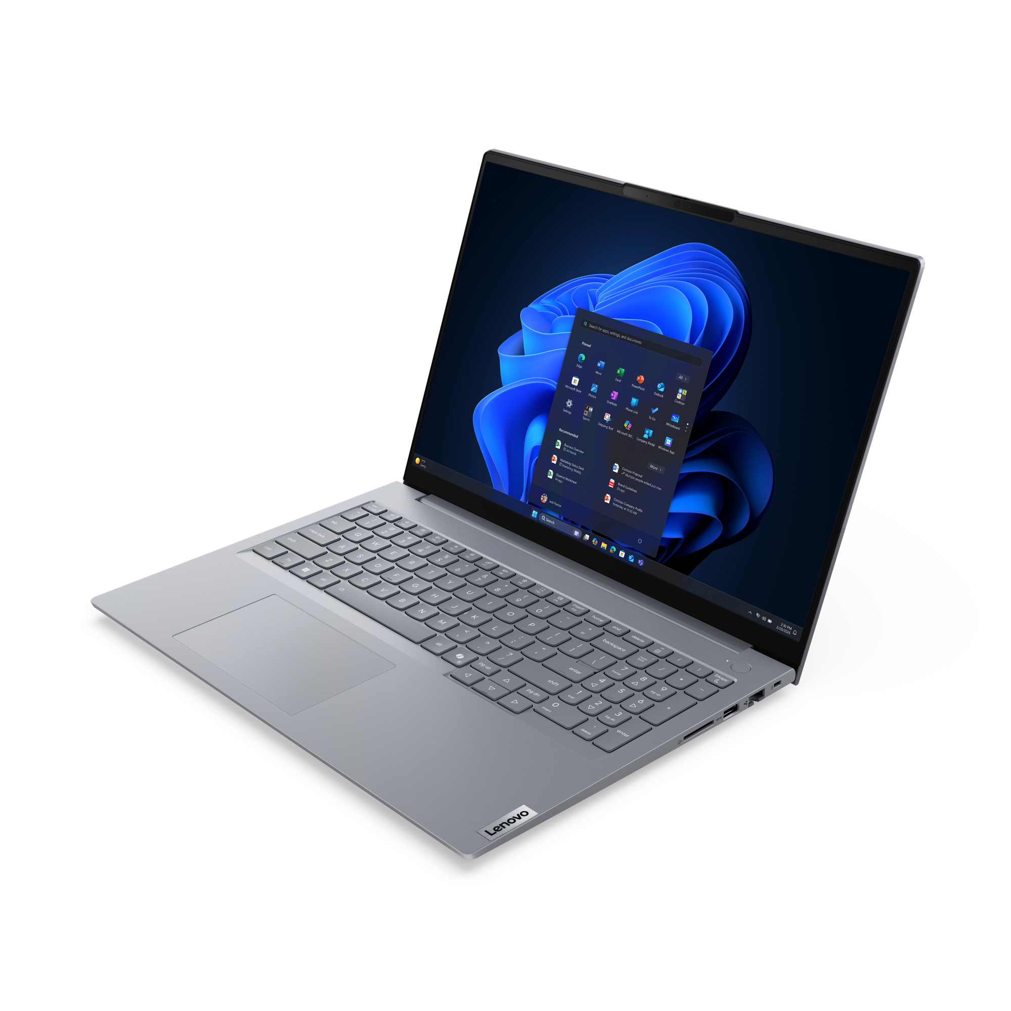 Ein silberner Lenovo Laptop mit beleuchteter Tastatur und dunklem Hintergrund.
