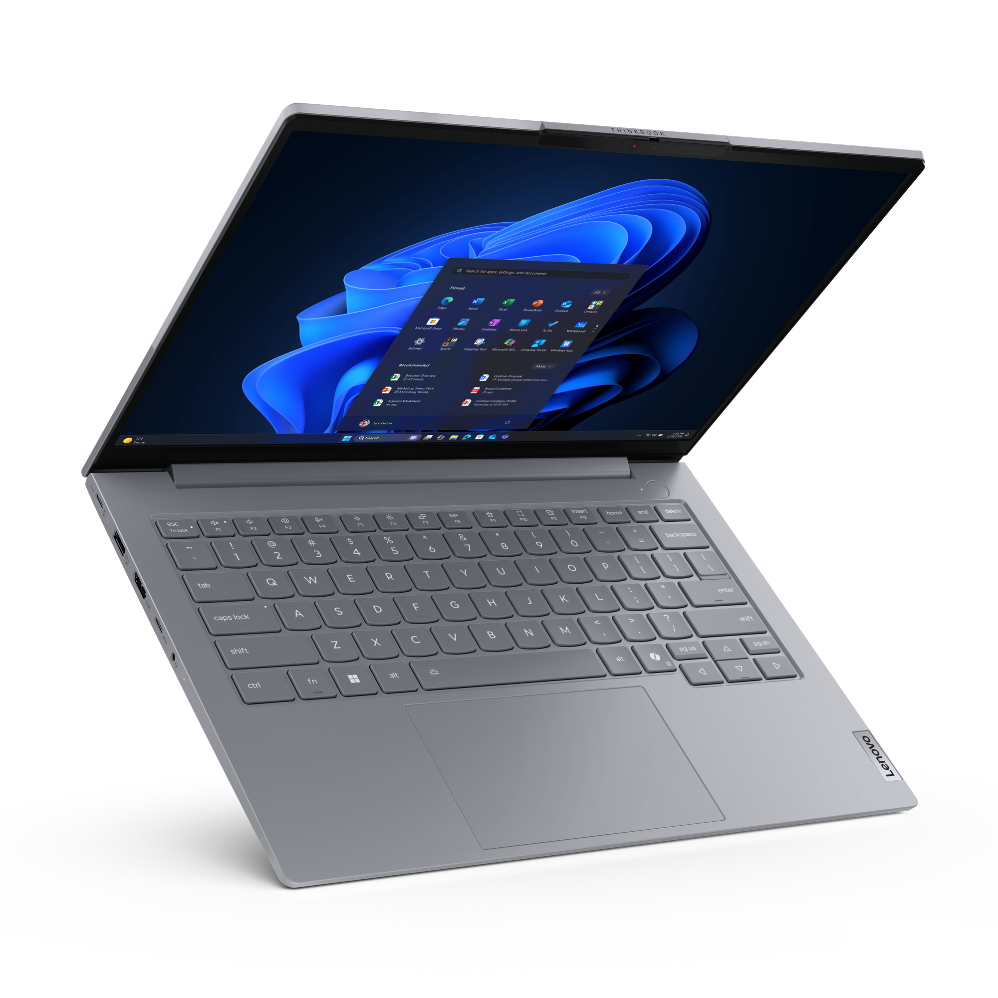 Ein graues Lenovo ThinkBook-Laptop mit geöffnetem Bildschirm, das auf einem schwarzen Hintergrund steht.