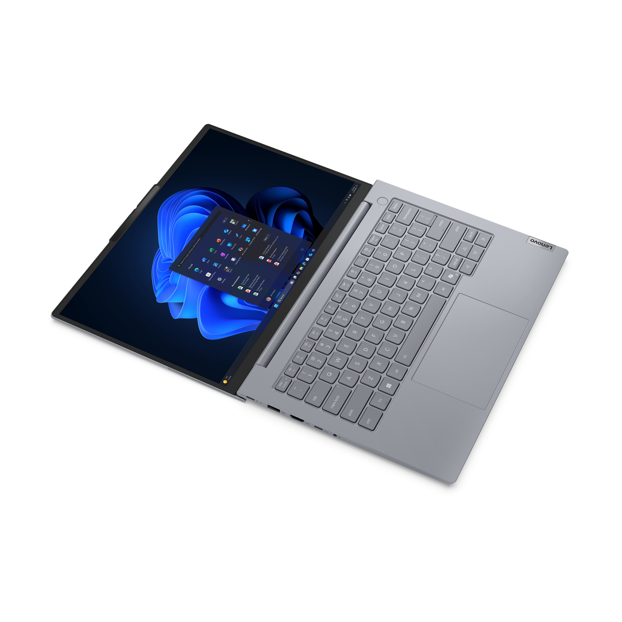Ein grauer Lenovo Laptop mit geöffnetem Bildschirm und Windows 11.