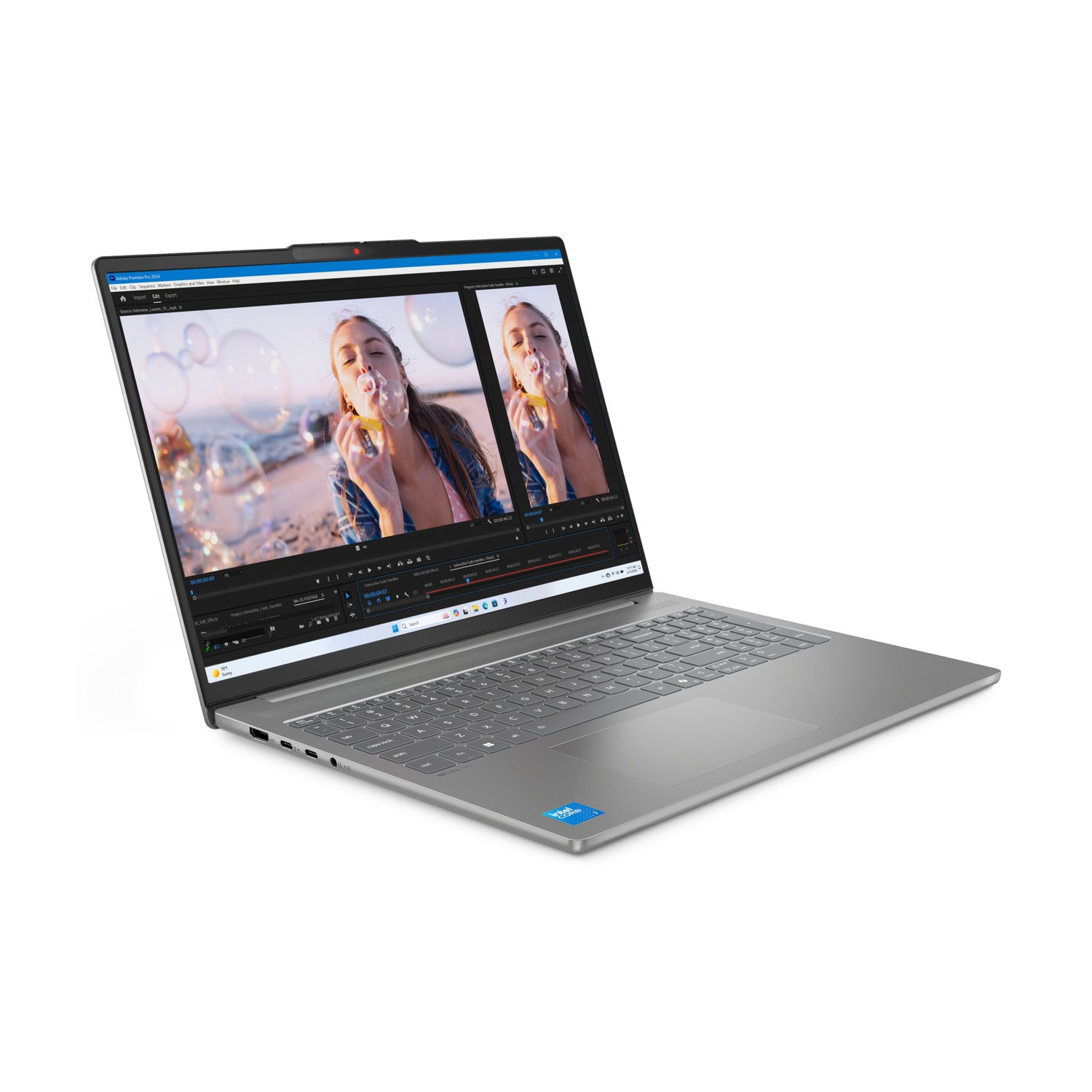 Un laptop mostra un software di editing video con una donna che soffia bolle.