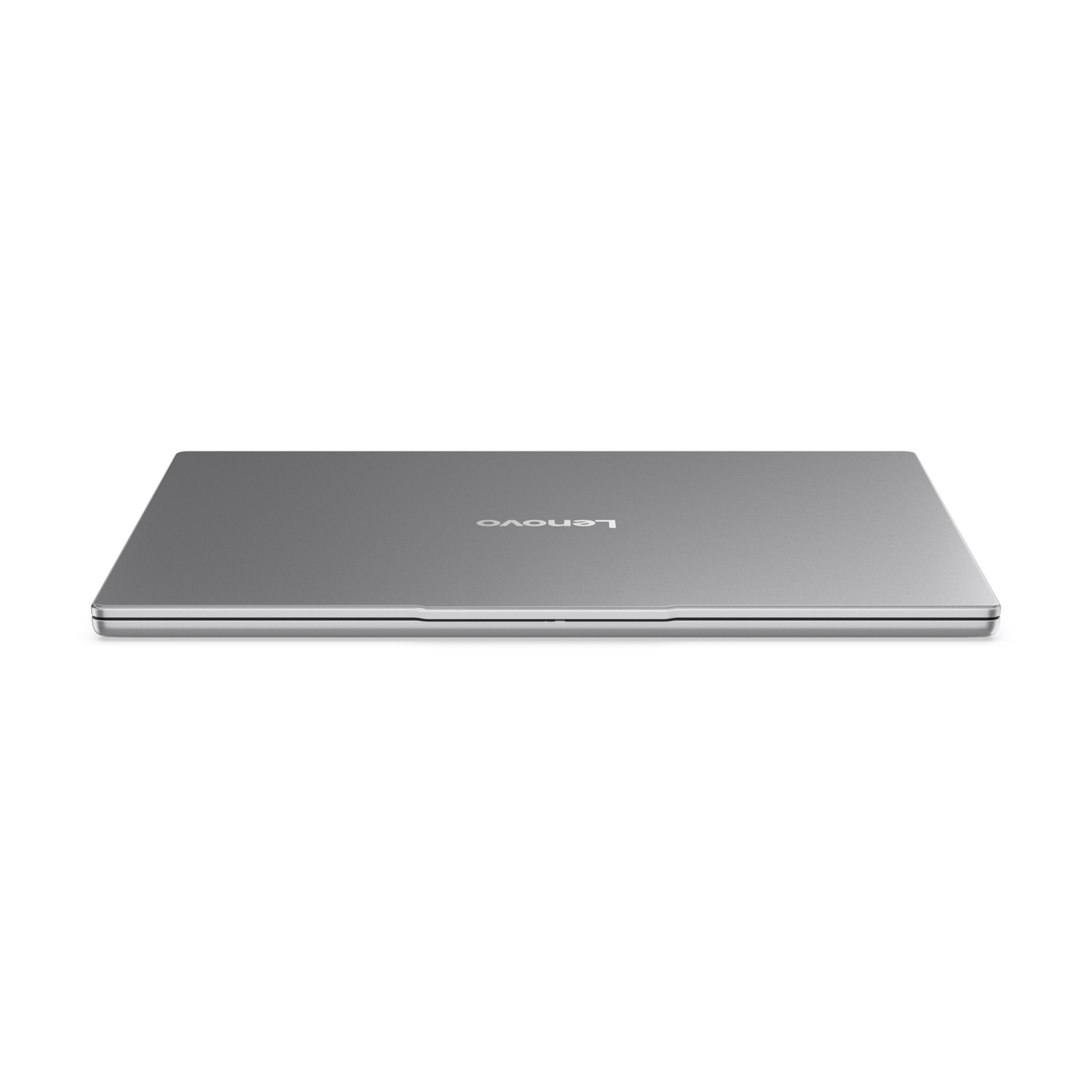 Laptop argentato chiuso con logo Lenovo sul coperchio, su sfondo bianco.