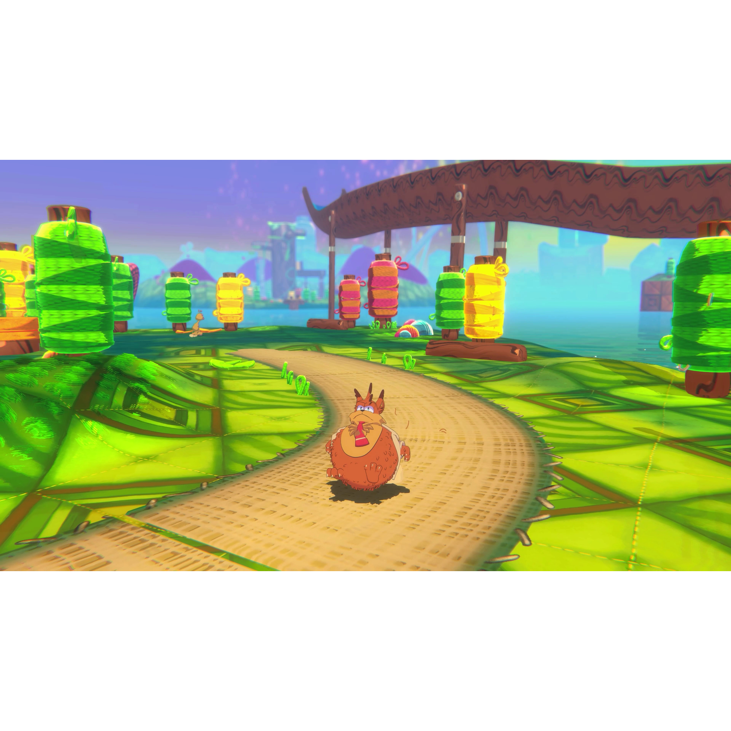Een cartoonmonster loopt over een pad in een kleurrijke wereld met gigantische spoelen.