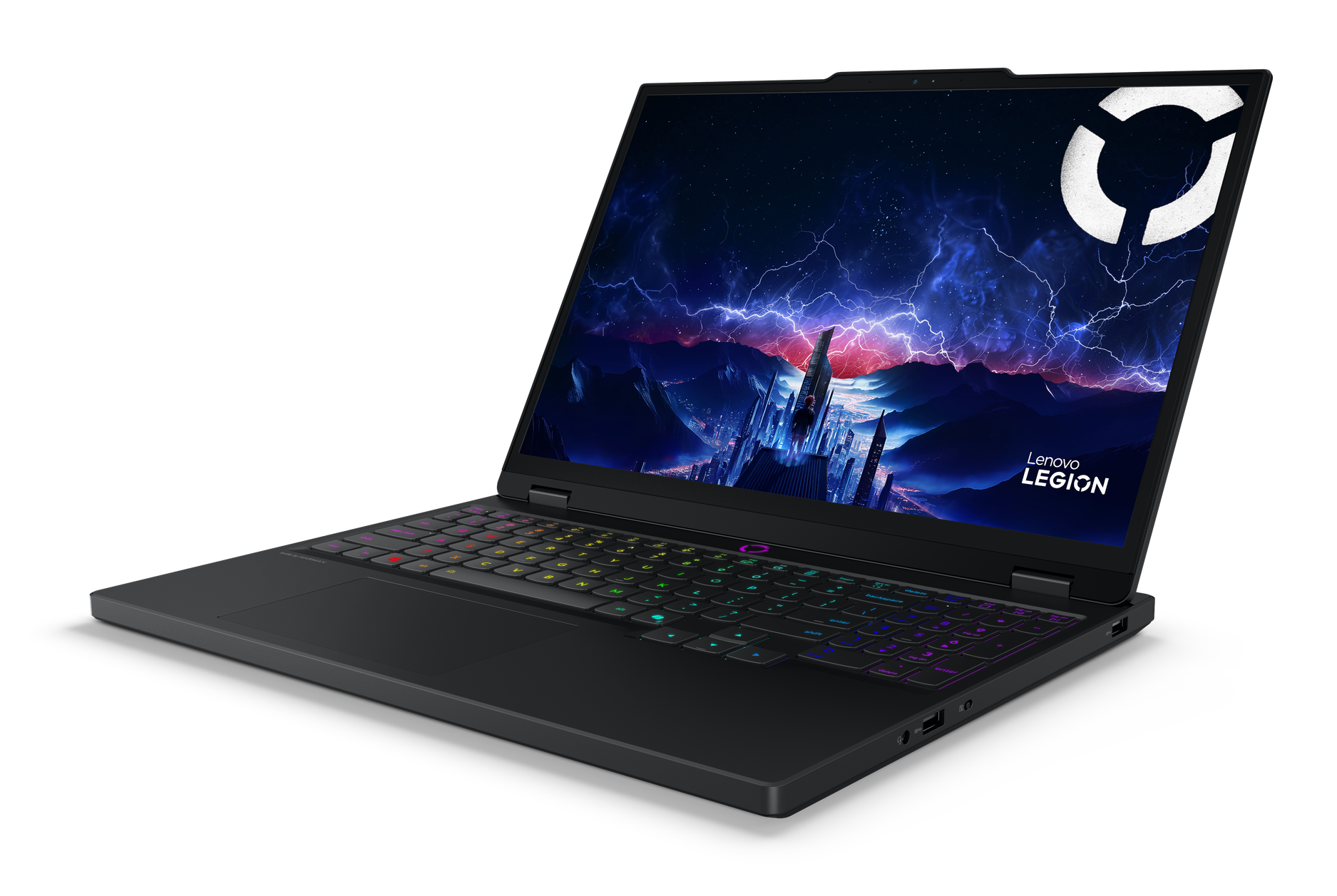 Czarny laptop Lenovo Legion z kolorową klawiaturą i futurystycznym tłem miasta.