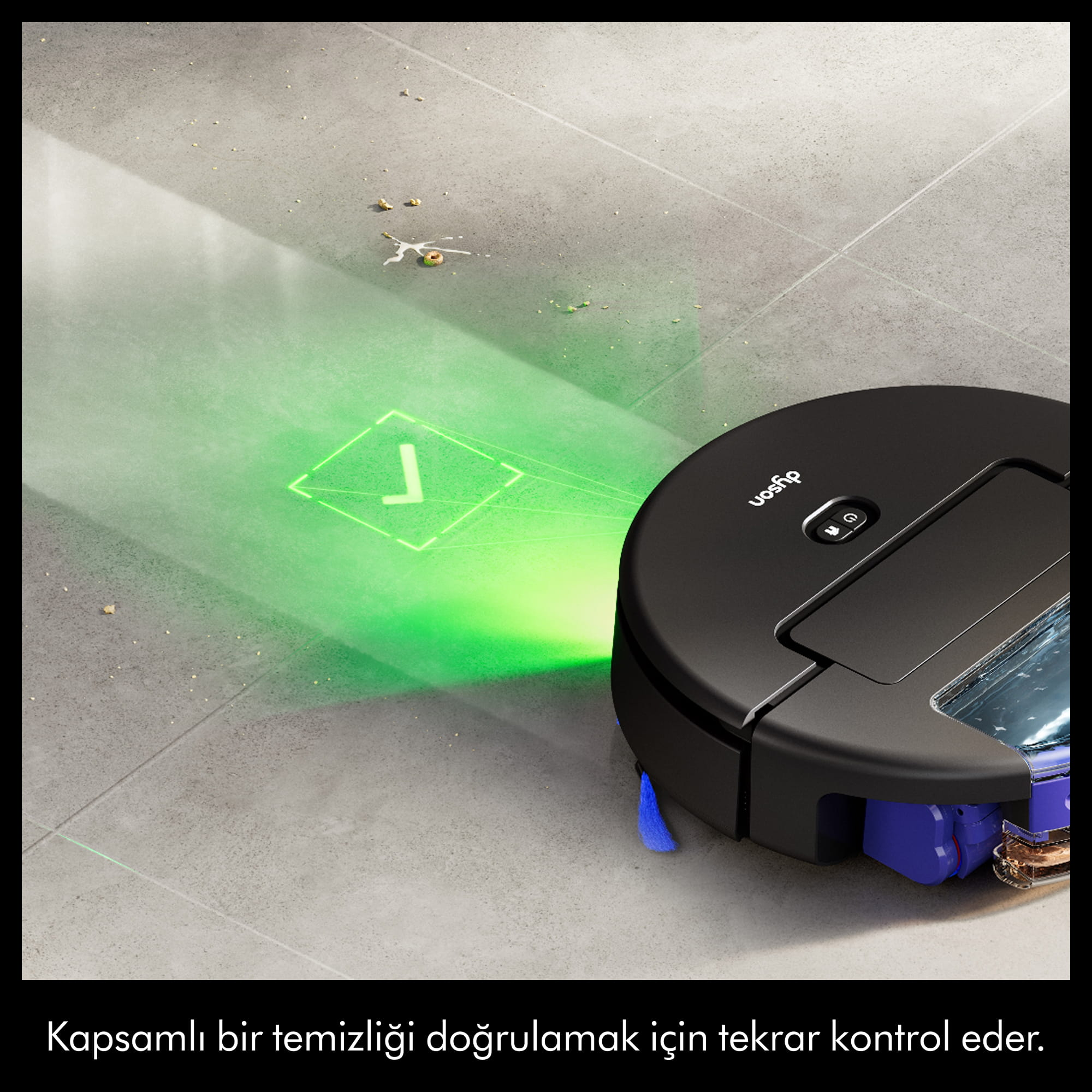 Siyah robot süpürge, yeşil lazer projeksiyonu ile gri zemini temizliyor.